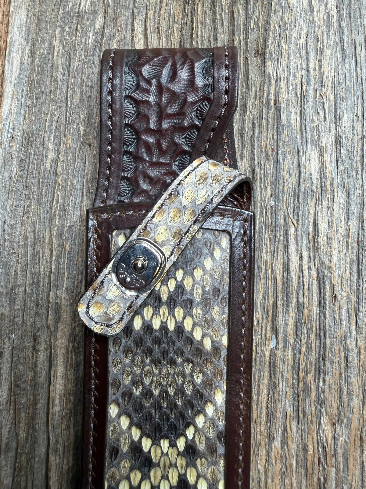 Randall Model Clinton Special sheath with an Eastern Diamondback RattleSnake skin from Treeman Sheaths. Hand tooled belt loop, canteen snap. Vibrant colors and one of the hardest skins to source.