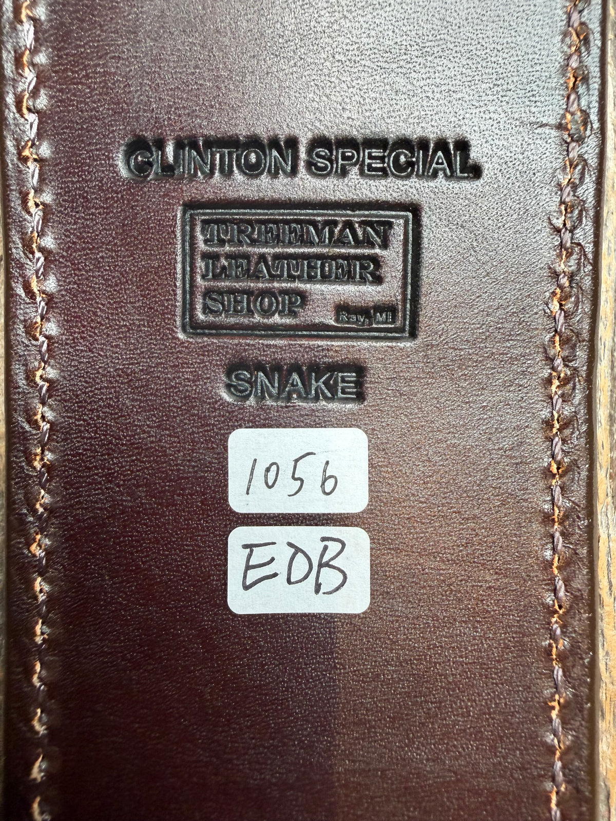 Randall Model Clinton Special sheath with an Eastern Diamondback RattleSnake skin from Treeman Sheaths. Hand tooled belt loop, canteen snap. Vibrant colors and one of the hardest skins to source.