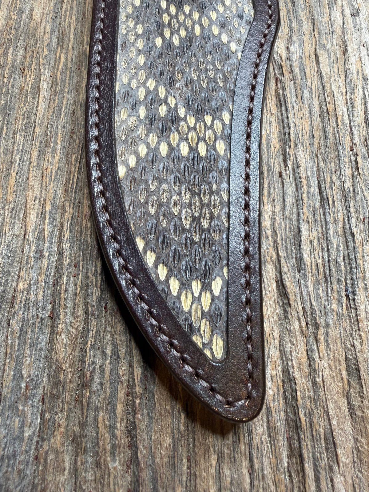 Randall Model 12-8 sheath with an Eastern Diamondback RattleSnake skin from Treeman Sheaths. Hand tooled belt loop, canteen snap. One of the hardest skins to source.