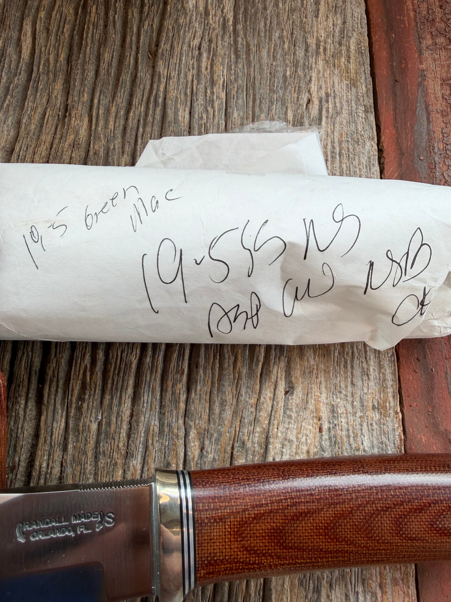 New in Paper Randall Model 19-5 Bushmaster with an Brown Micarta handle. SS blade, Nickel silver single hilt. Lanyard. Brown leather sheath.