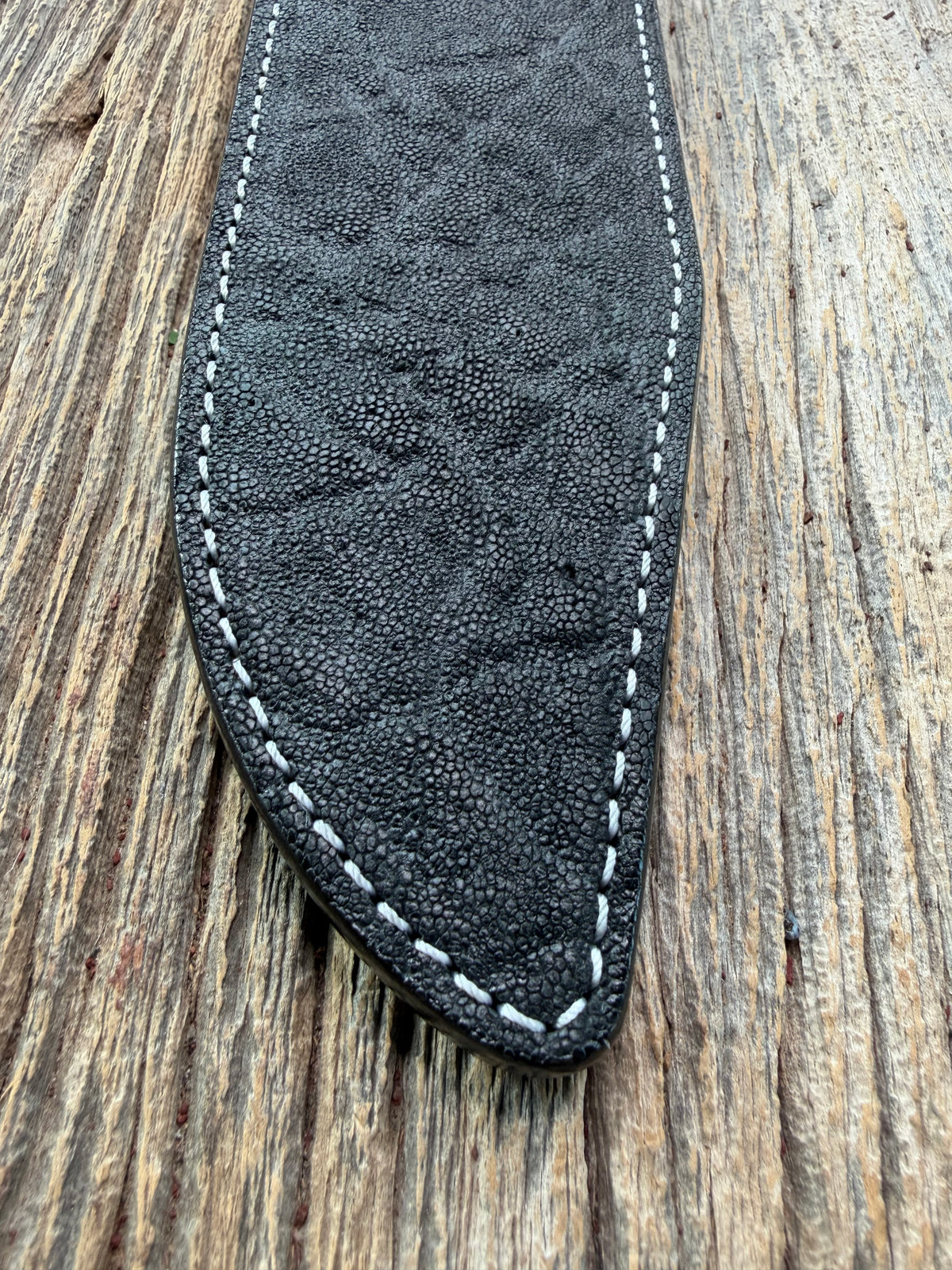 New Randall Model 12-9 Sheath in Exotic Black Matte Elephant Hide from Treeman with a Black Canteen snap. White thread deviated stitching on black leather..Killer sheath.