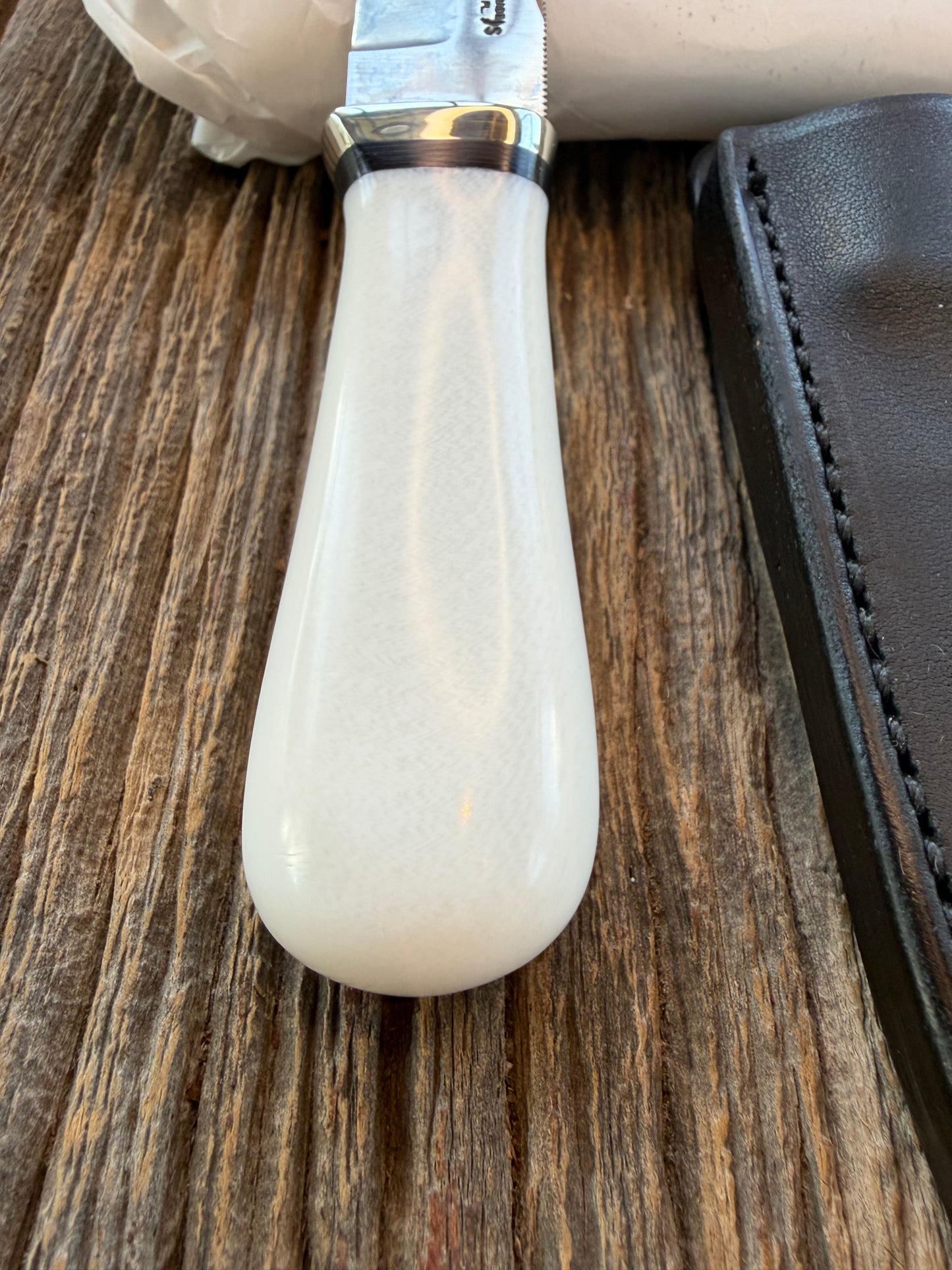 New in Paper Randall Model “Gambler” 4 Inch in Ivorite Nickel hilt, Stainless, black single spacer.