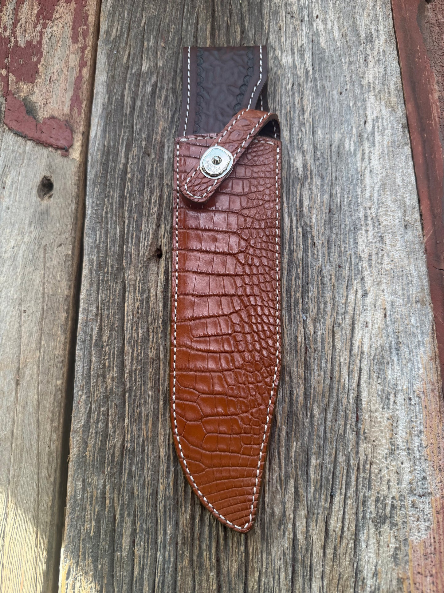 New Randall Model 12-9/14 Grind Sheath in Exotic thick and textured Honey Crocodile skin on brown leather from Treeman with a silver Canteen snap. Hand tooled belt loop. Killer sheath.