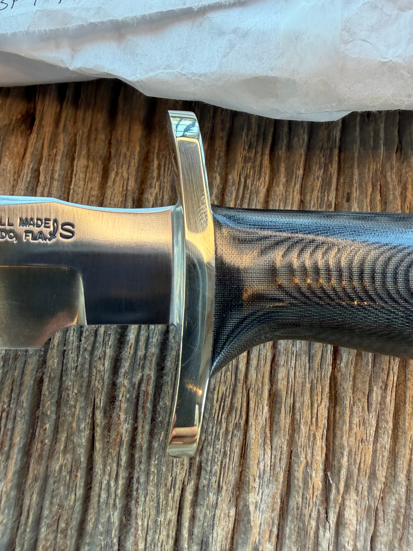 New in Paper Randall Model 16 SP#1 Special fighter with a Black Micarta handle. SS blade, Nickel silver Forward Curved hilt. Lanyard. Brown leather sheath.