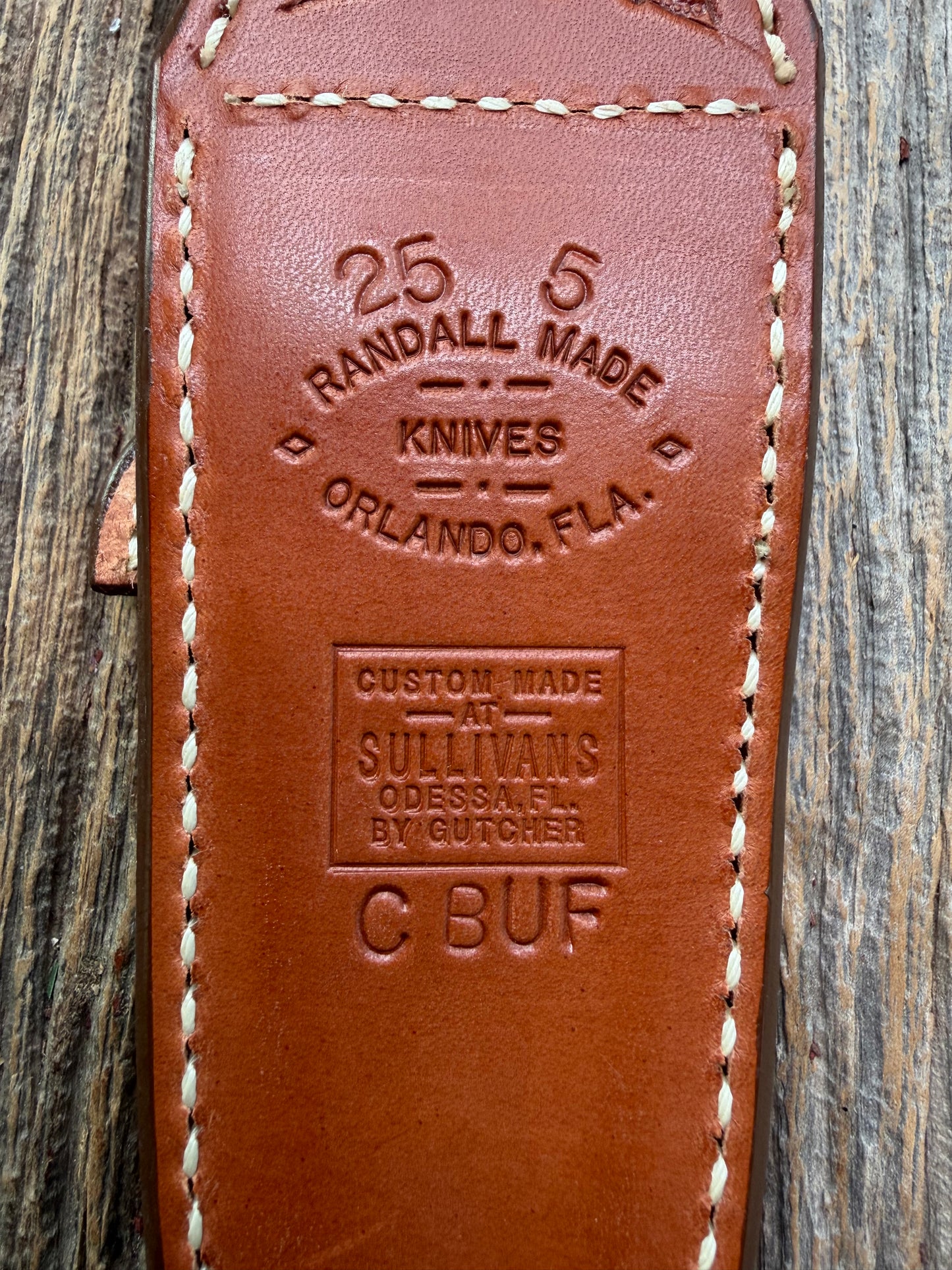 Pristine Randall Model 25-5 sheath in Exotic Cape Buffalo leather from Sullivans by Gutcher. Heavily tooled belt loop and strap. Randall snap and clean stamping on the back … perfect!!