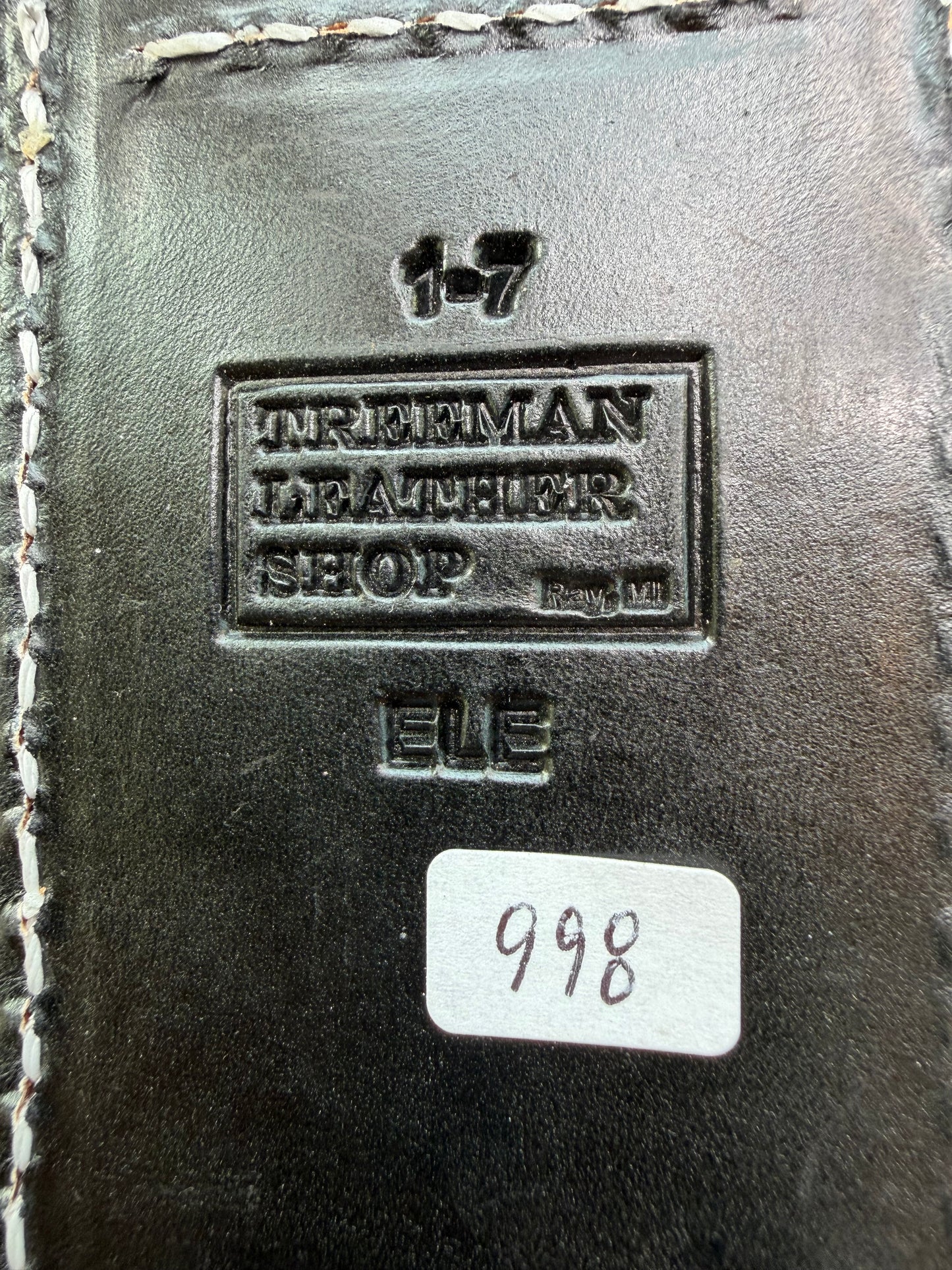 New Randall Model 1-7 Sheath in Exotic thick and textured Black Elephant hide on black leather from Treeman with a black Canteen snap. Hand tooled belt loop. Killer sheath.