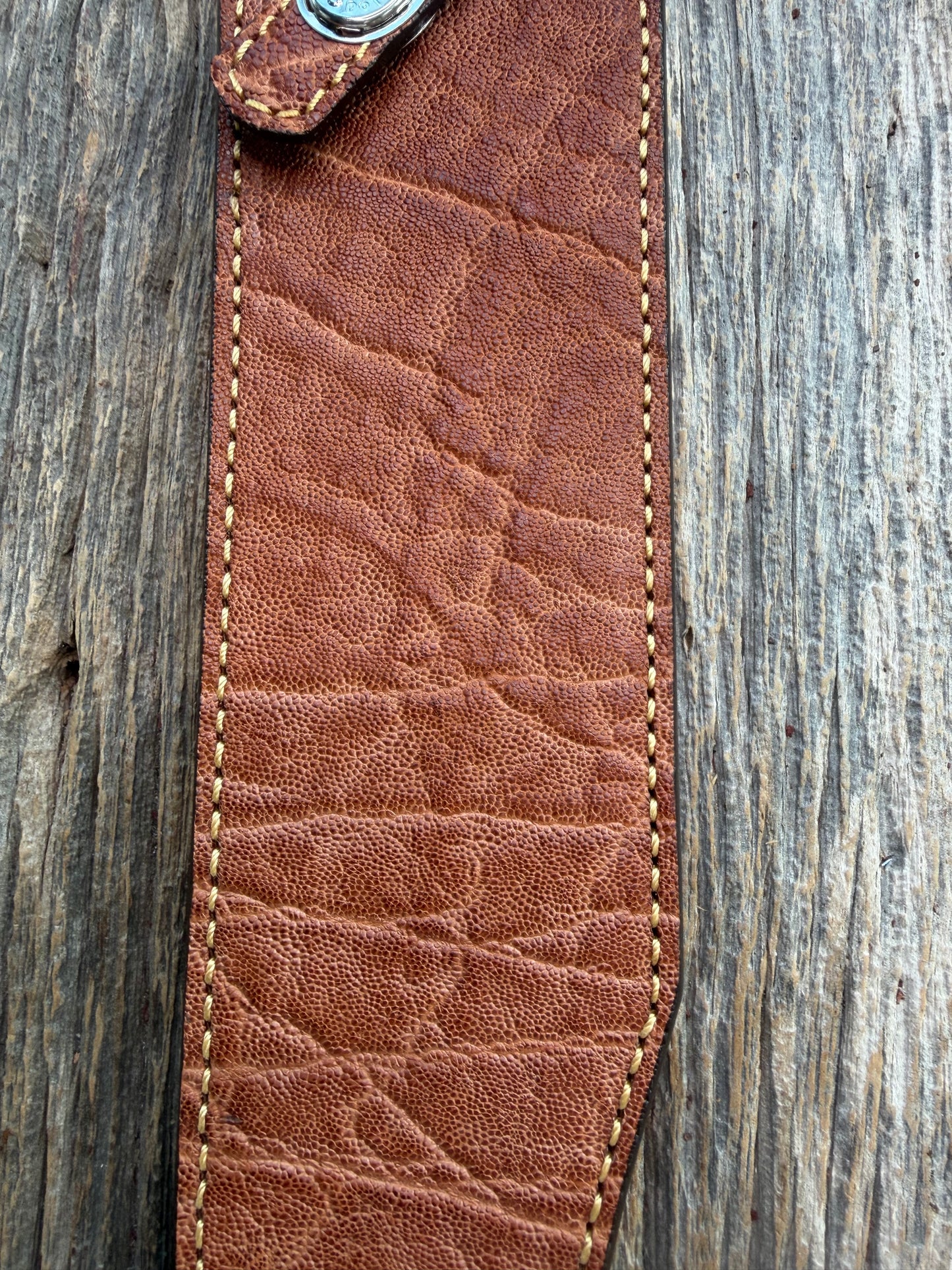 New Randall Model 12-11 Confederate Sheath in Exotic thick and textured Rust colored Elephant hide on brown leather from Treeman with a silver Canteen snap. Hand tooled belt loop. Killer sheath.