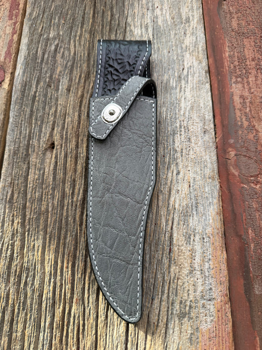 New Randall Model 12-8 Big Bear Sheath in Exotic thick and textured Grey Elephant Hide on black leather from Treeman with a silver Canteen snap. Hand tooled belt loop. Killer sheath.