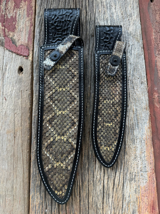 Randall Model Large Sasquatch and Small Sasquatch sheath pair with inlayed Western Diamondback RattleSnake skins from Treeman Sheaths. Very dark skins on brown leather, white deviated stitching and black canteen snaps.