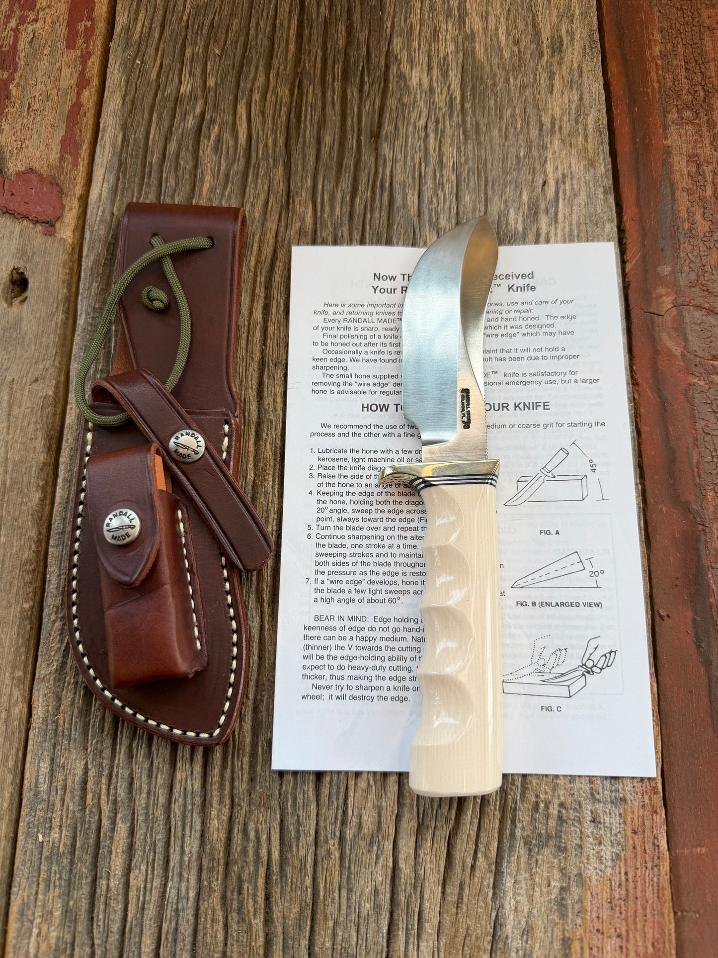New Randall Model Bowles Skinner # 504 with a Warthers Resin finger grooves handle. Nickel silver Single Hilt and natural end with a compass.