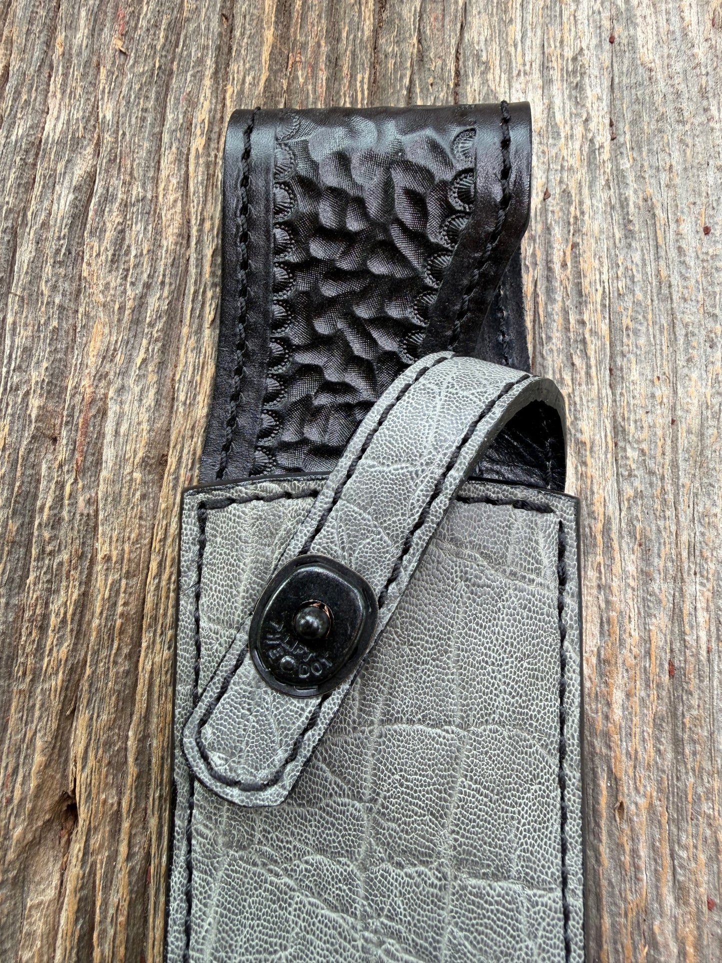New Randall Model 12-8 Big Bear Sheath in Exotic thick and textured Grey Elephant Hide on black leather from Treeman with a black Canteen snap. Hand tooled belt loop. Killer sheath.