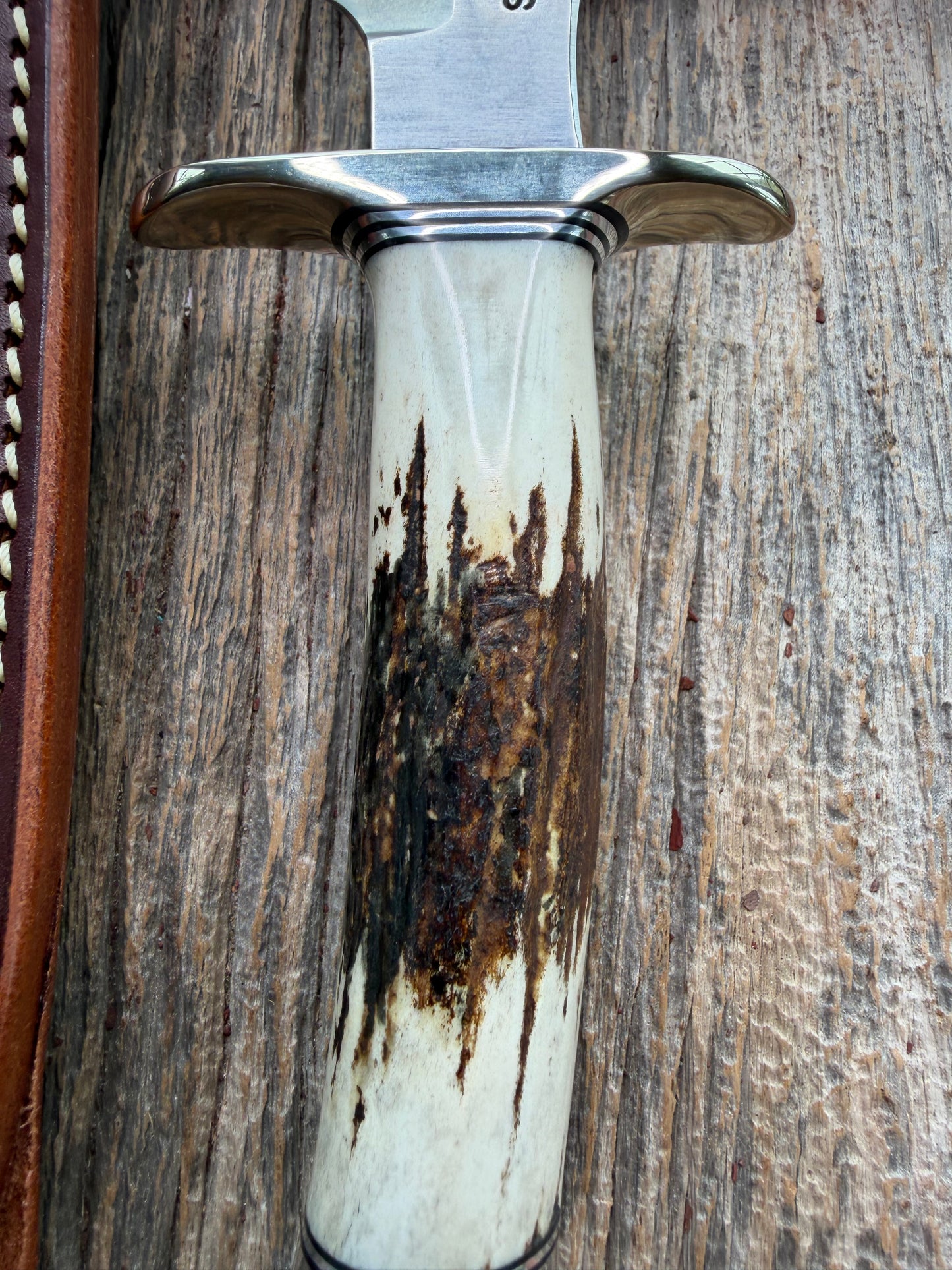 New in Paper Randall Made Knife Model 1-7 Stag , Stainless, Black and Aluminum spacers, Nickel Silver Hilt, Aluminum butt cap.