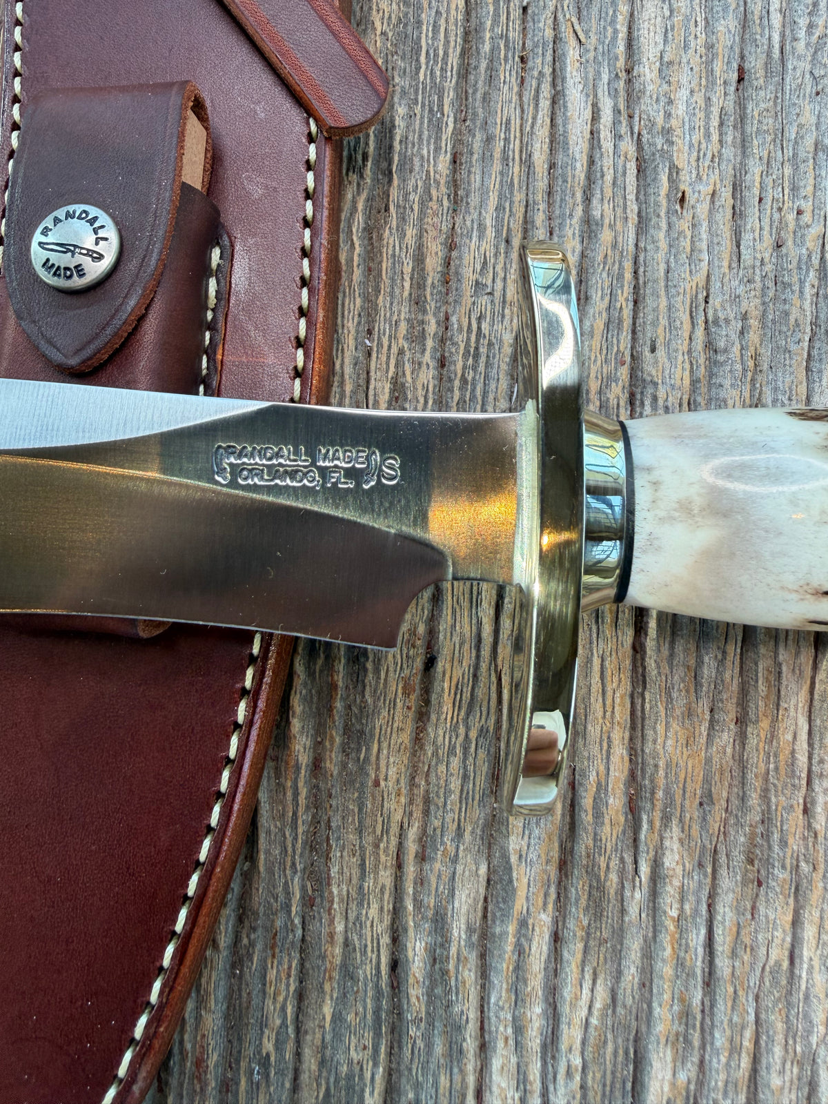 New in Paper Randall Model 12-8 Small Sasquatch with a really nice piece of stag. #1112, Nickel Silver collar and butt cap.