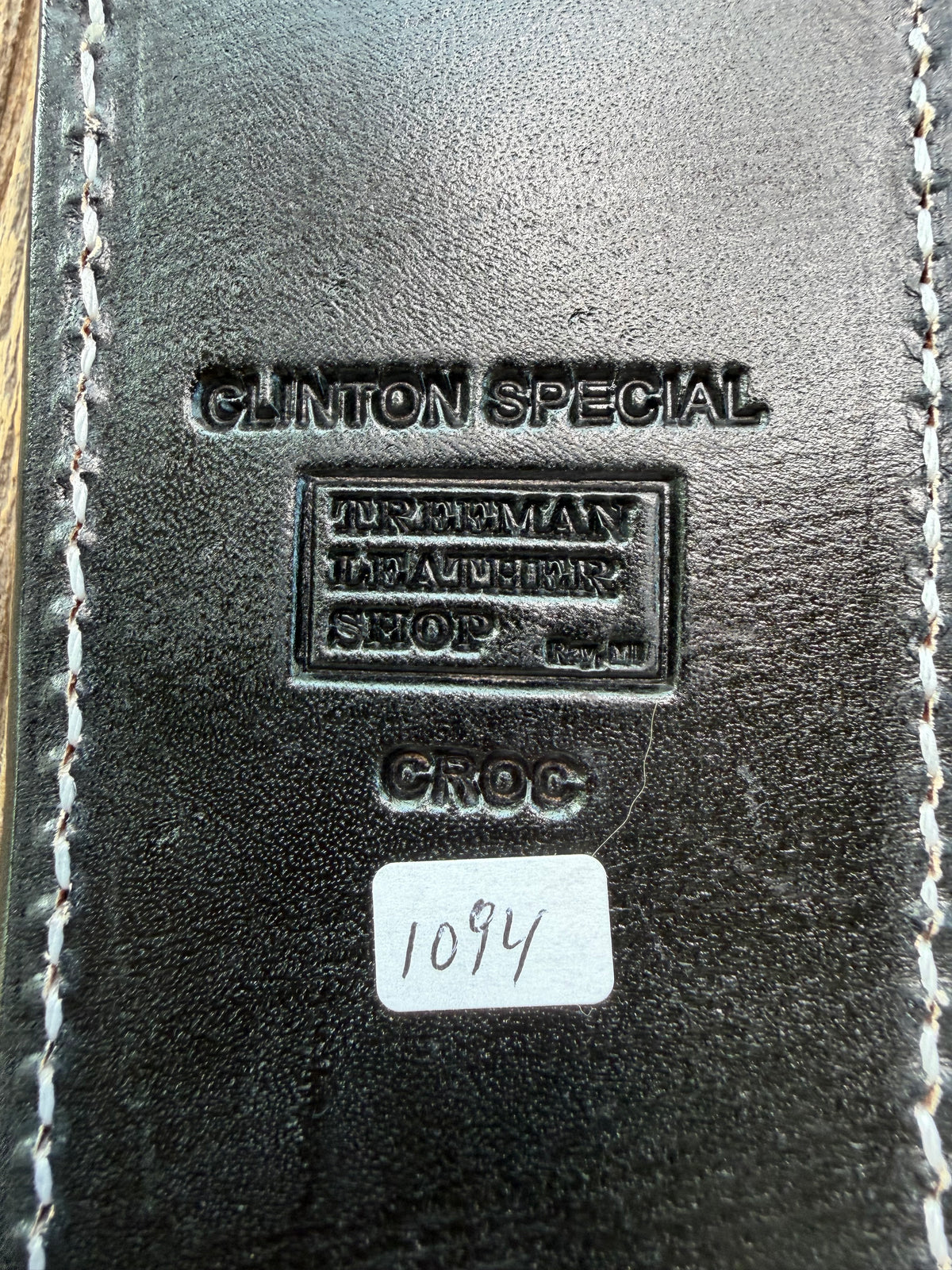 New Randall Model Clinton Special Sheath in Exotic Black Matte Crocodile tail from Treeman with a Black Canteen snap. White thread deviated stitching on black leather..Killer sheath.