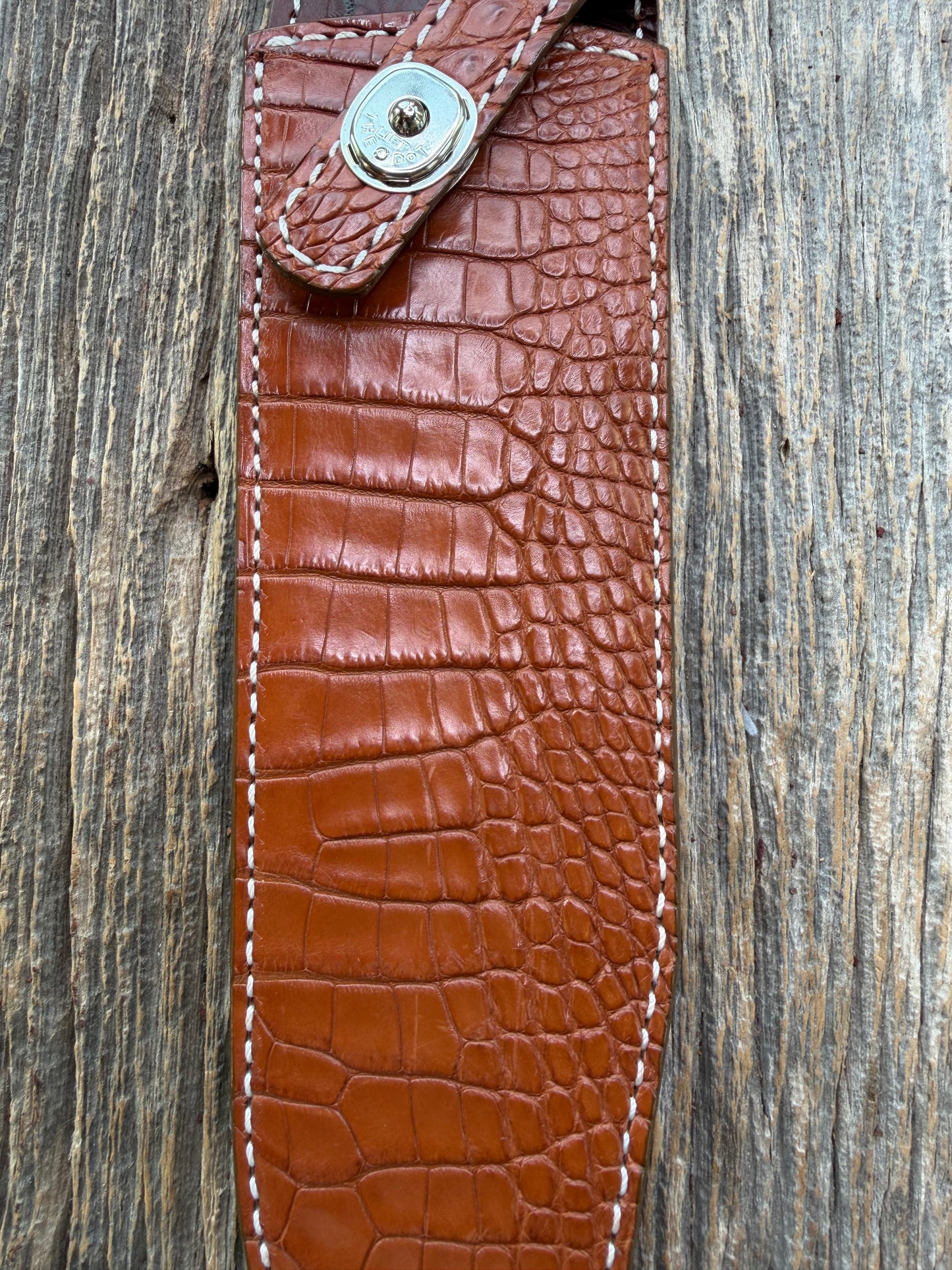 New Randall Model 12-9/14 Grind Sheath in Exotic thick and textured Honey Crocodile skin on brown leather from Treeman with a silver Canteen snap. Hand tooled belt loop. Killer sheath.