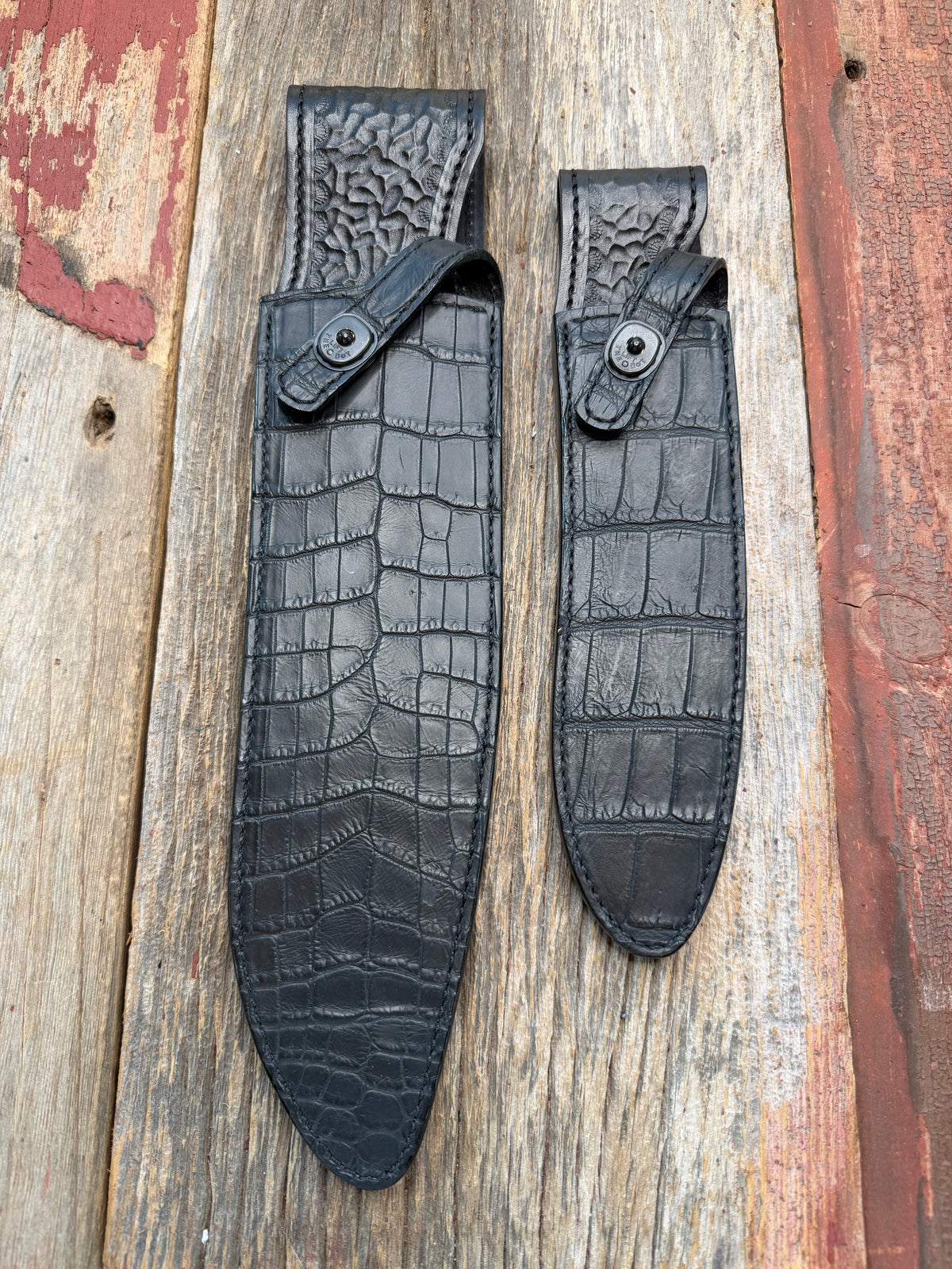 New Randall Model Large and Small Sasquatch pair in Exotic Black Matte Crocodile from Treeman with the newest Black Canteen snap. Killer sheaths.