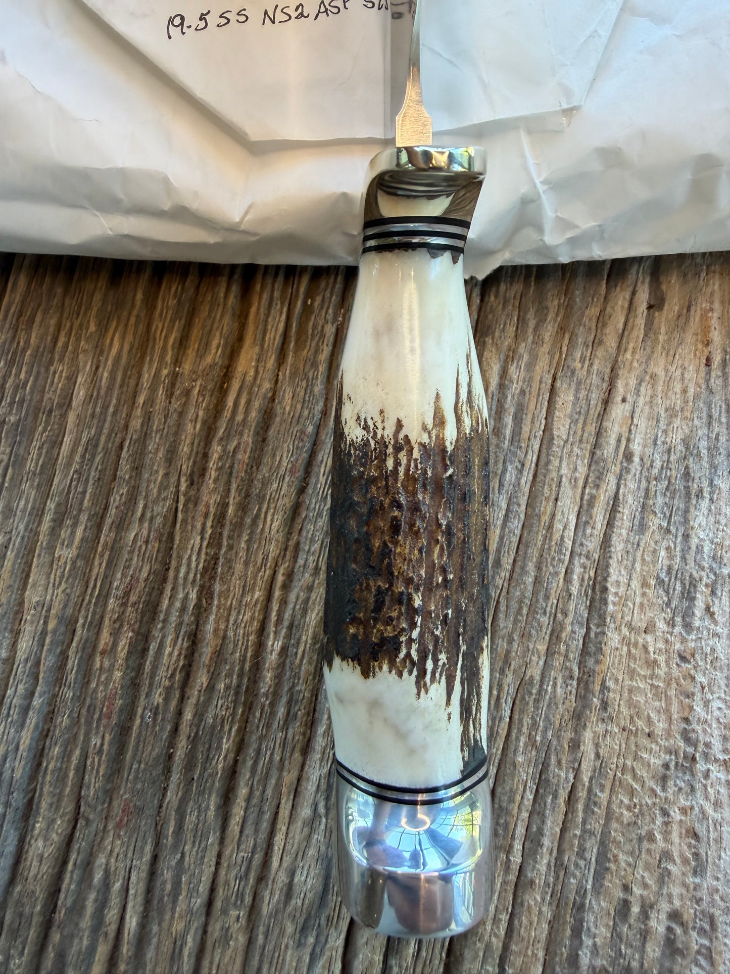 New in Paper Randall Model 19-5 with a Gnarly piece of Stag. Nickel silver Hilt and Aluminum crows beak Butt cap.