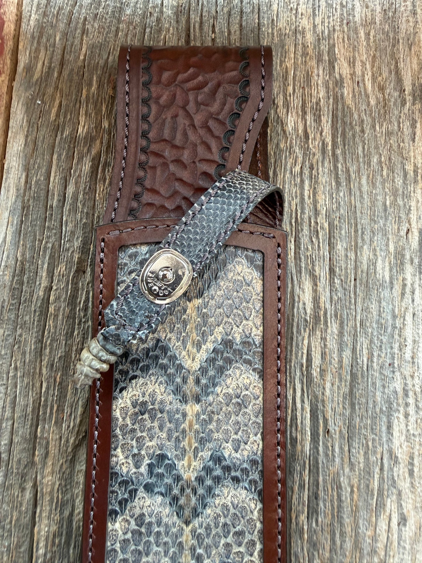 Randall Model 12-11 Smitty Sheath in Exotic Canebreak RattleSnake with the original Rattles tail made into the strap. An absolute gem 1/1 from Treeman Sheaths. Tremendous colors on this one.