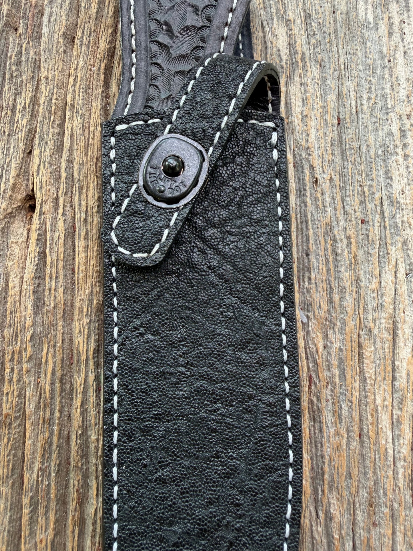 New Randall Model 1-7 Sheath in Exotic thick and textured Black Elephant hide on black leather from Treeman with a black Canteen snap. Hand tooled belt loop. Killer sheath.