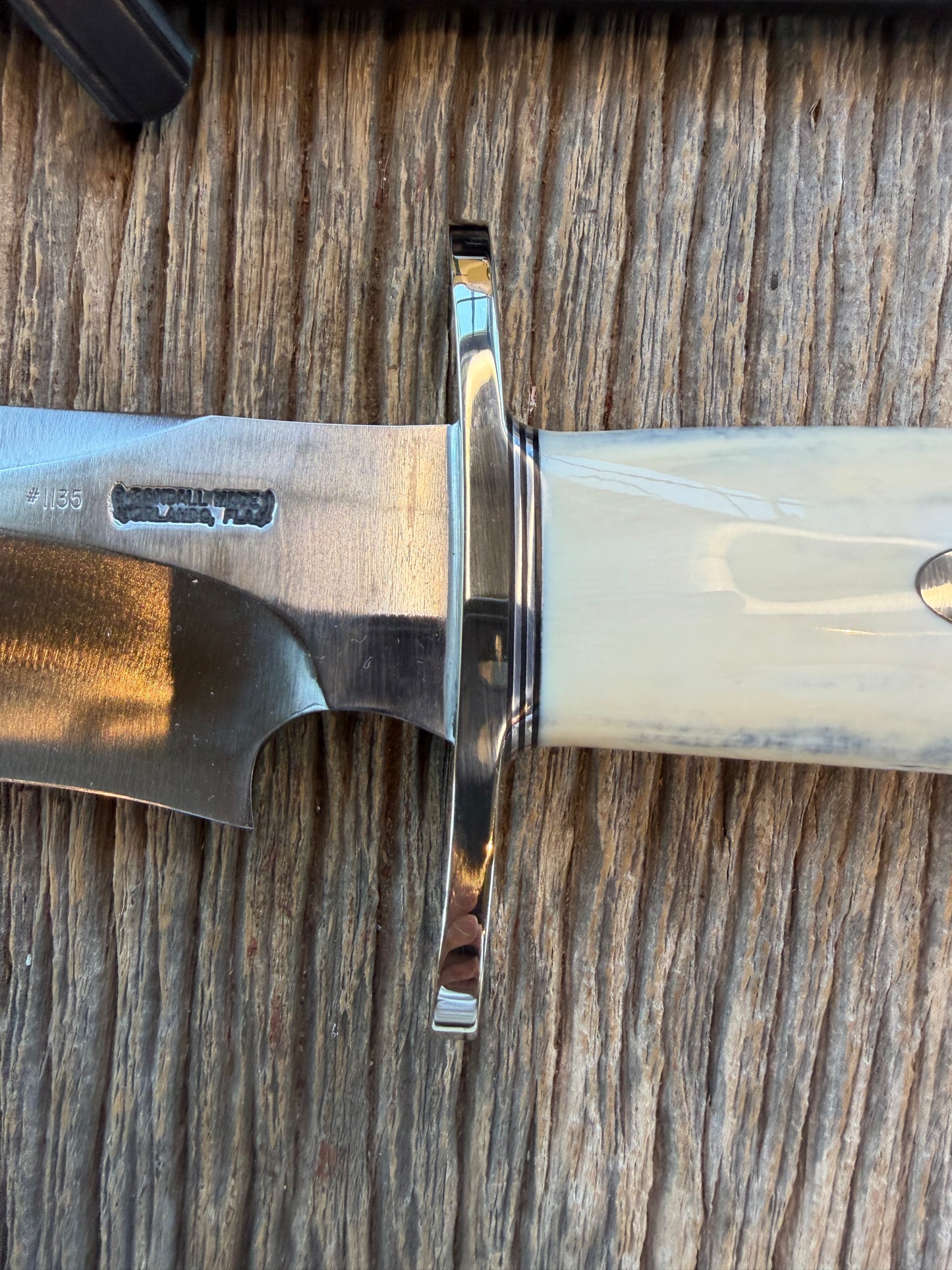 New in Paper Randall Model 12-11 Dealer Special Large Sasquatch Huge piece of Pearly White/Blue Fossil Walrus Ivory, # 1135 Nickel Silver Hilt and butt cap, nickel nameplate.