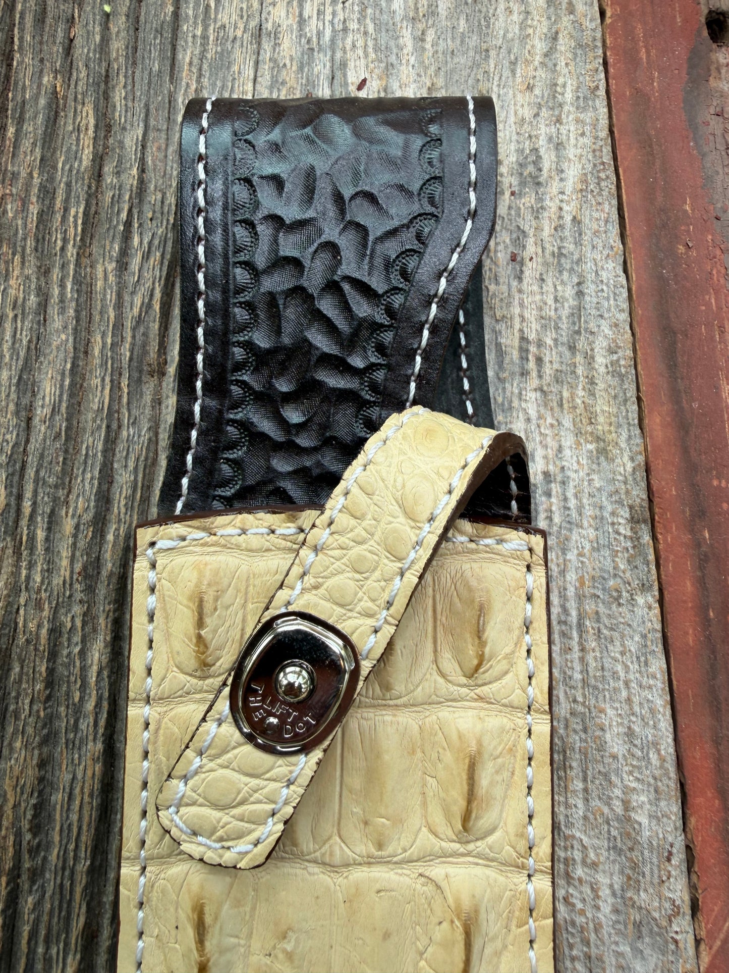 New Randall Model 12-9/14 Grind Sheath in Exotic Ivory Matte Crocodile (tail portion) from Treeman with a silver Canteen snap. Killer sheath.