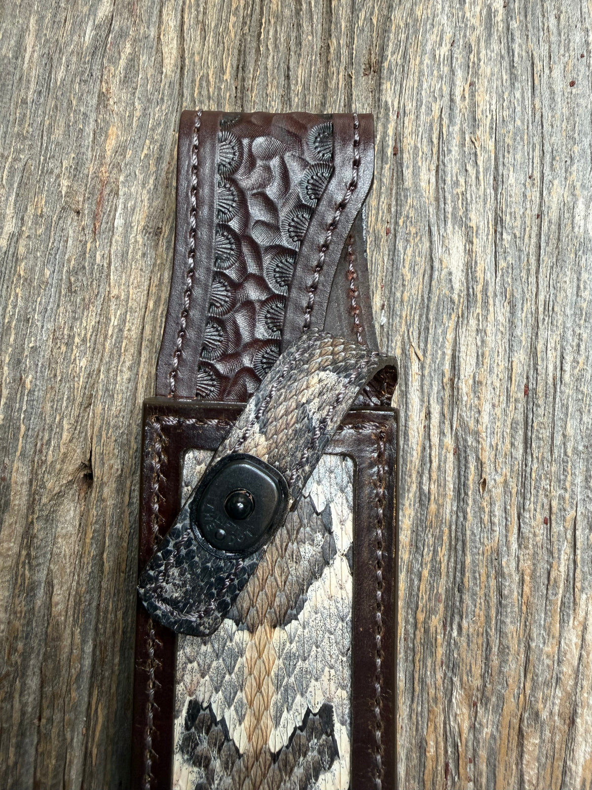 Randall Model 1-8 sheath with a Canebrake RattleSnake skin from Treeman Sheaths. Vibrant colors and along side Copperheads the hardest skin to source.