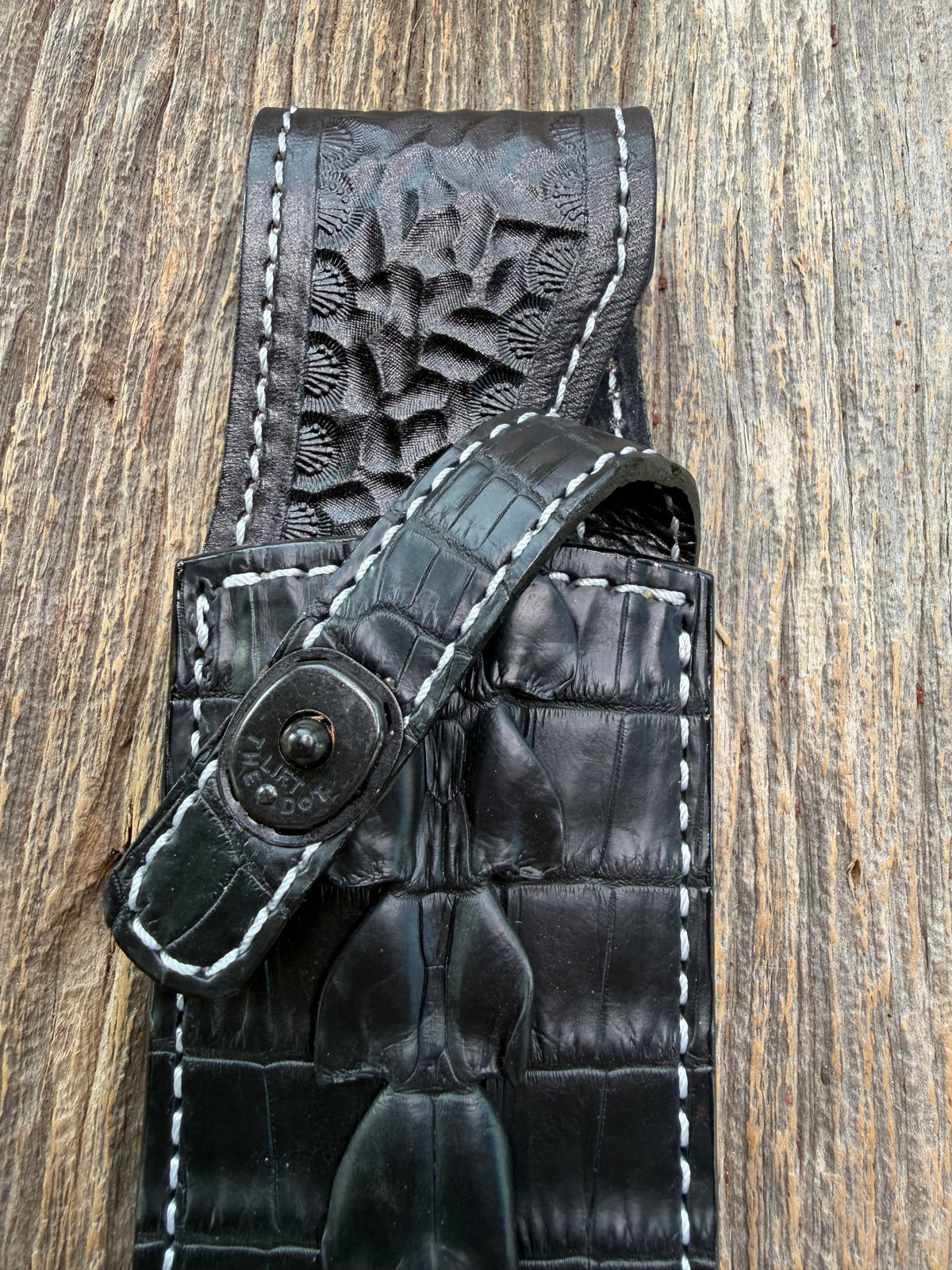 New Randall Model Clinton Special Sheath in Exotic Black Matte Crocodile tail from Treeman with a Black Canteen snap. White thread deviated stitching on black leather..Killer sheath.