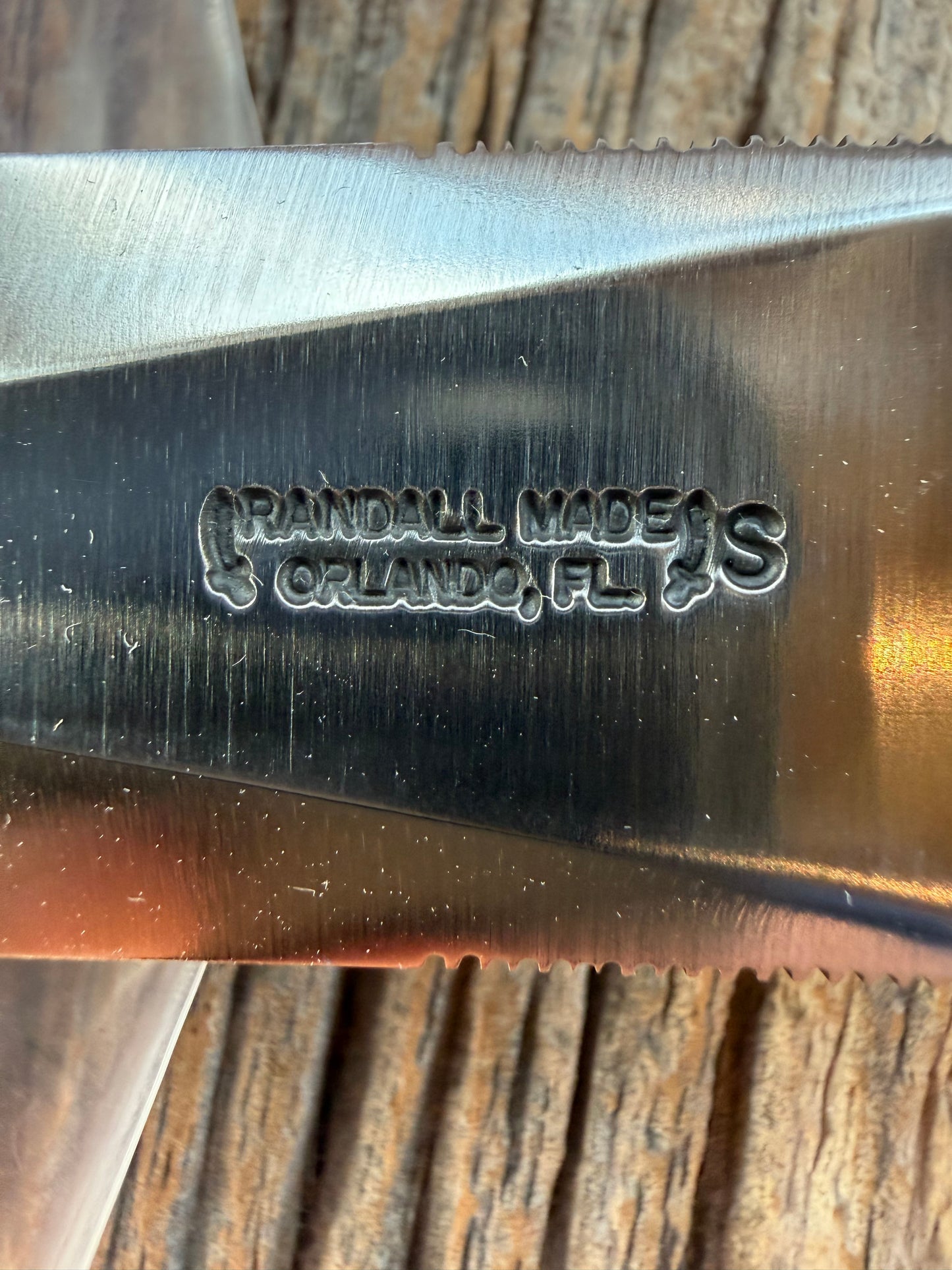 New in Paper Randall Model 24 Guardian in Black Micarta Nickel hilt, Stainless, red white blue spacers.