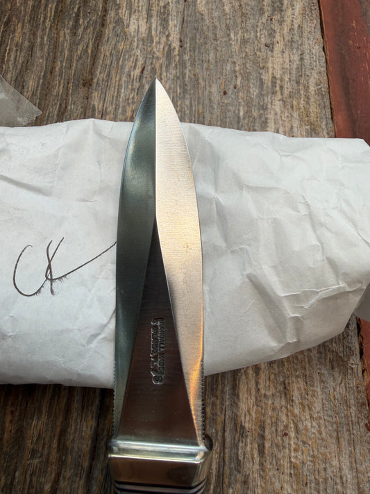 New in Paper Randall Model 24 Guardian in Black Micarta Nickel hilt, Stainless, black and aluminum spacers.