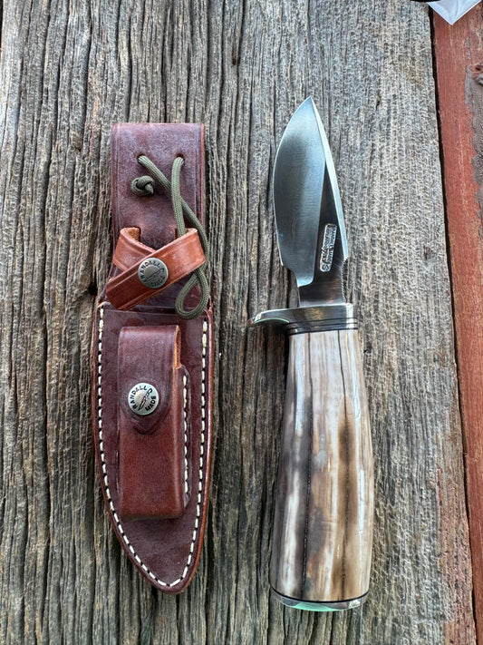 Randall Knife Model 11-4.5 Fossil Walrus Handle, Sterling Sliver Hilt, Spacers and Butt plate. I bought this from Rick Bowles directly. Stainless Steel