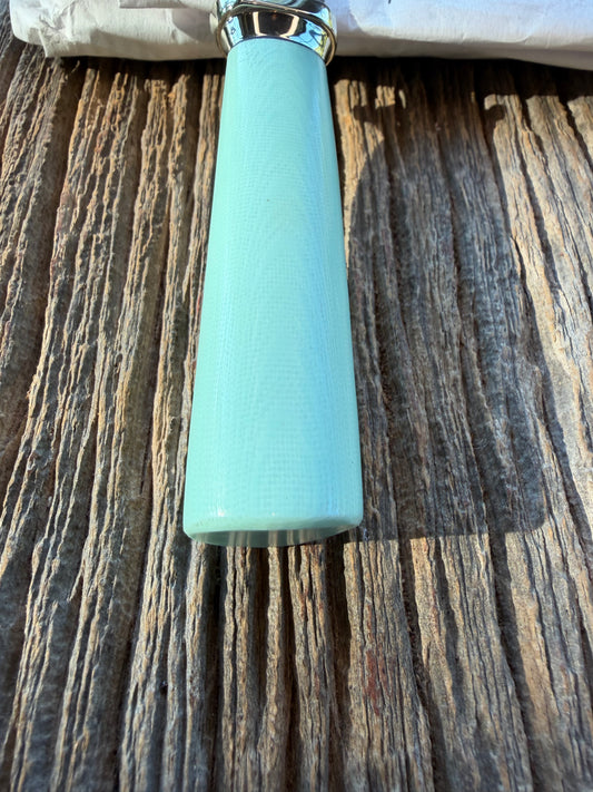 New in Paper Randall Non Catalog Model  Cattleman. G 10 Tiffany handle. Nickel Silver collar, Stainless blade.