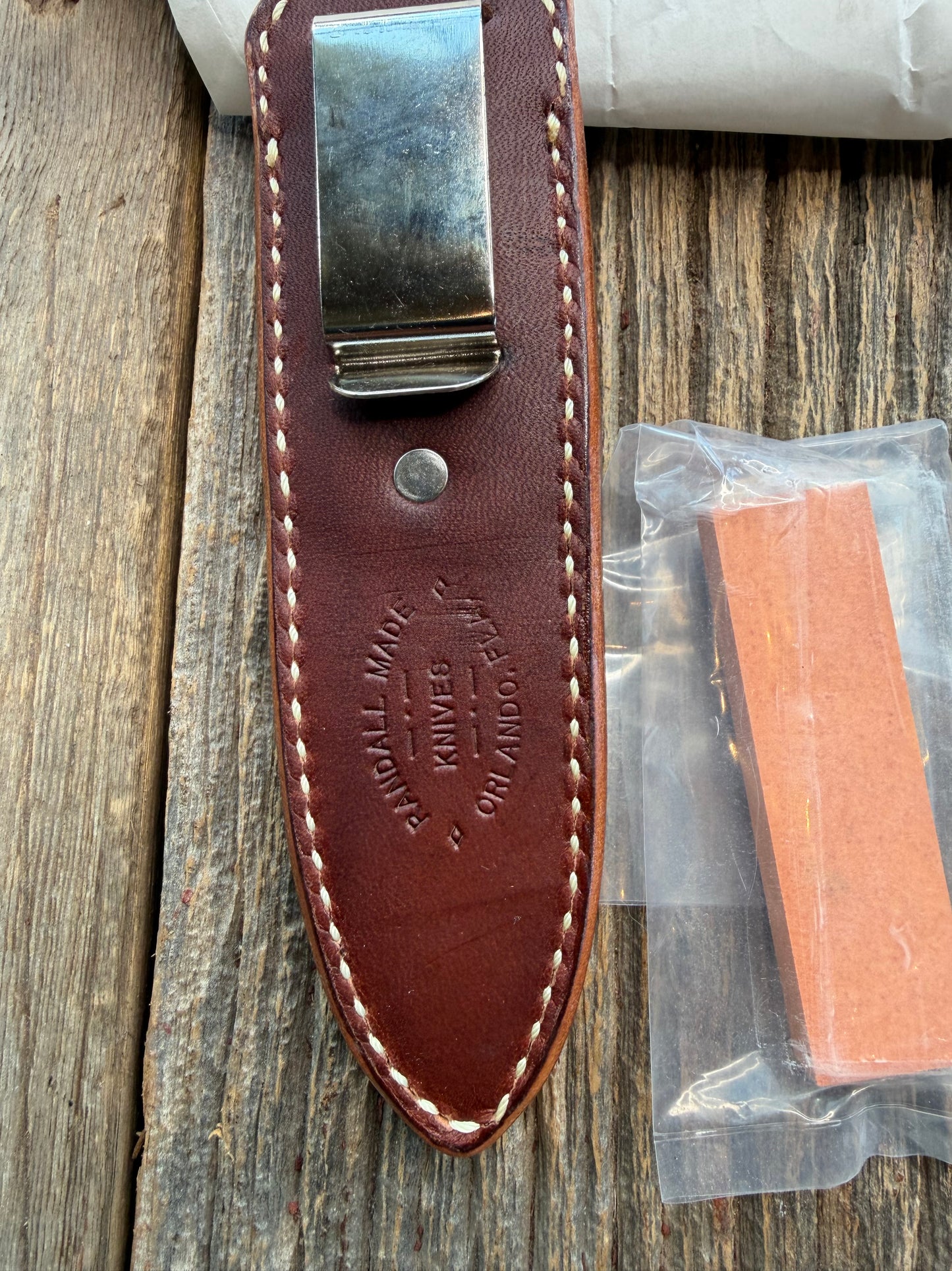 New in Paper Randall Model 24 Guardian in Black Micarta Nickel hilt, Stainless, black and aluminum spacers.