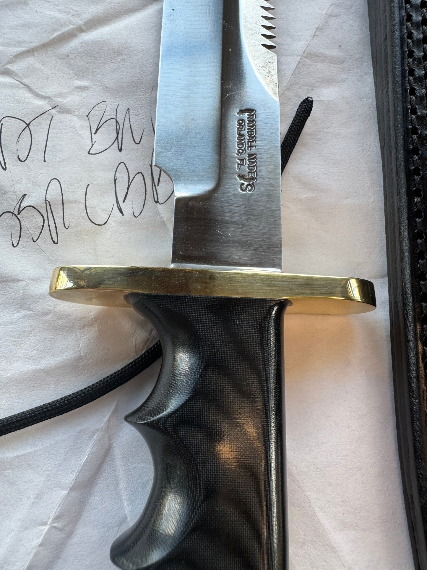 New in Paper Randall Knife Model 14 CDT Black Micarta Brass Hilt Full Tang Stainless, Sawteeth, black sheath.