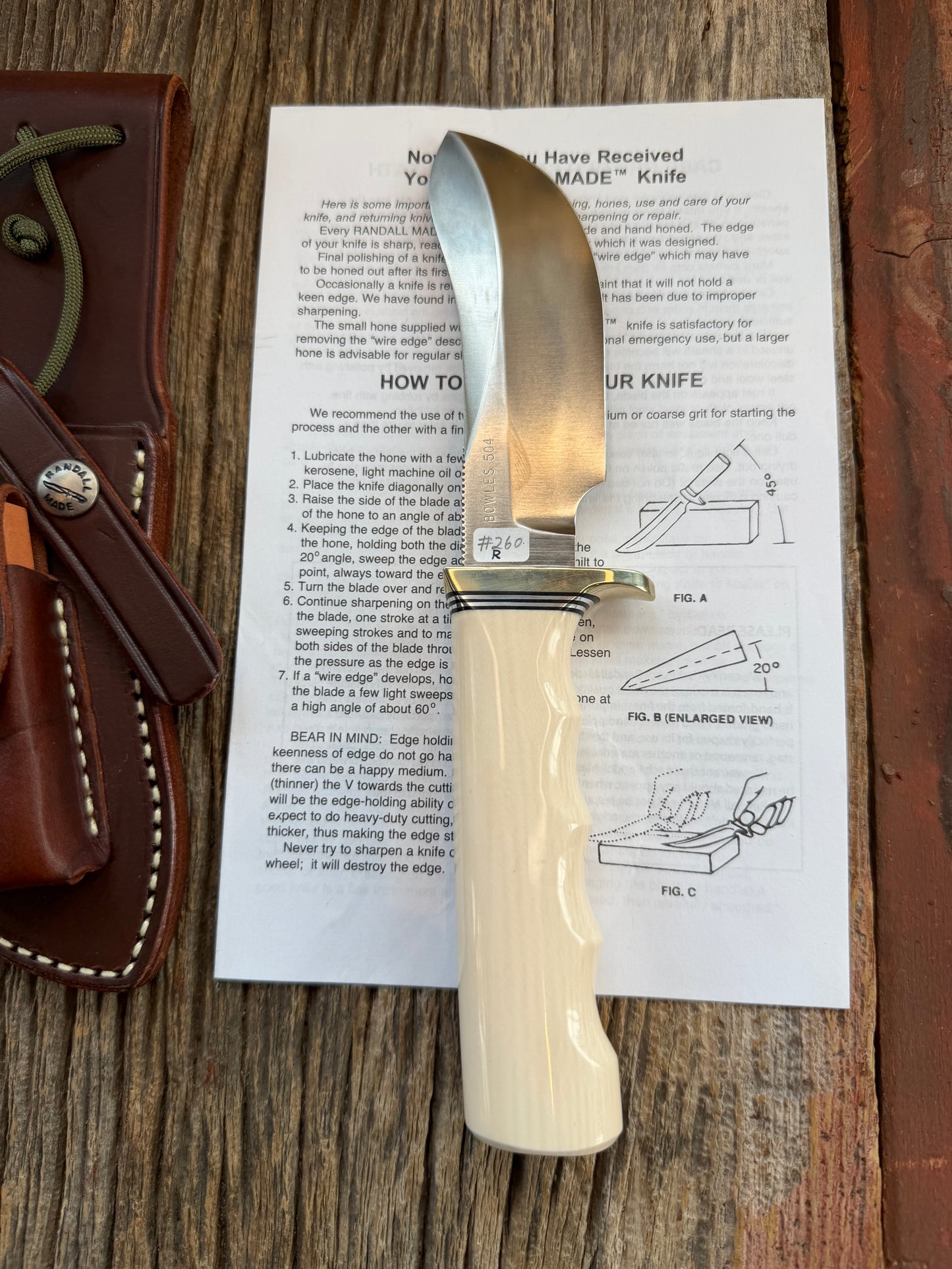 New Randall Model Bowles Skinner # 504 with a Warthers Resin finger grooves handle. Nickel silver Single Hilt and natural end with a compass.