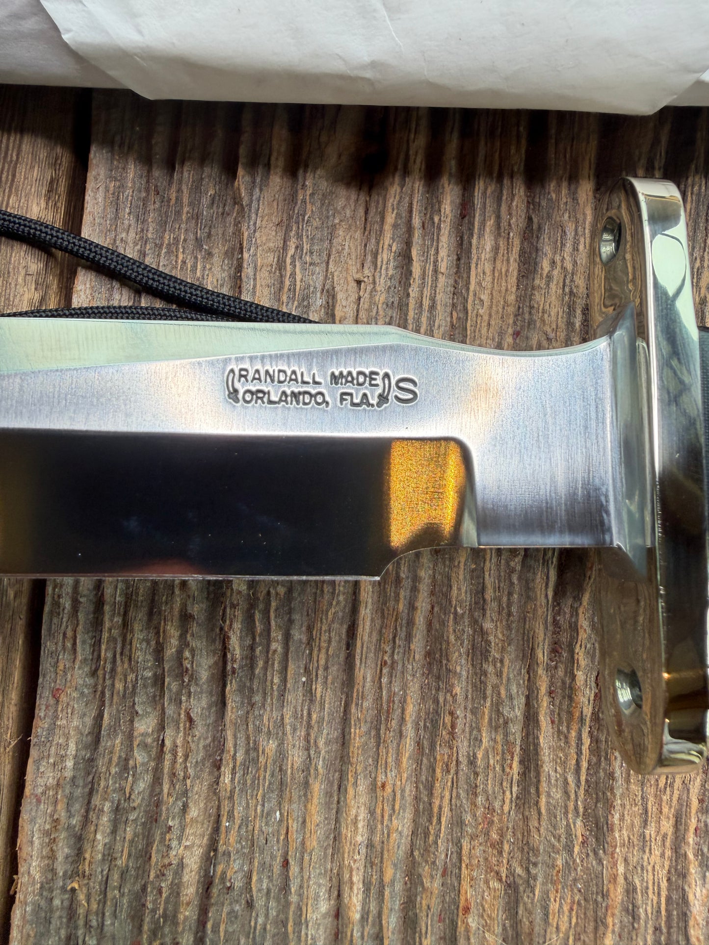 New in Paper Randall Model 16 SP#1 Special fighter with a Black Micarta handle. SS blade, Nickel silver Double hilt. Lanyard. Brown leather sheath.