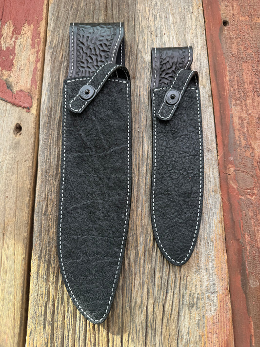 New Randall Model 12-11 Large Sasquatch and 12-8 Small Sasquatch Sheaths in Exotic thick and textured Black Elephant hide on black leather from Treeman with a black Canteen snap. Hand tooled belt loop. Killer sheath. Selling as a pair…