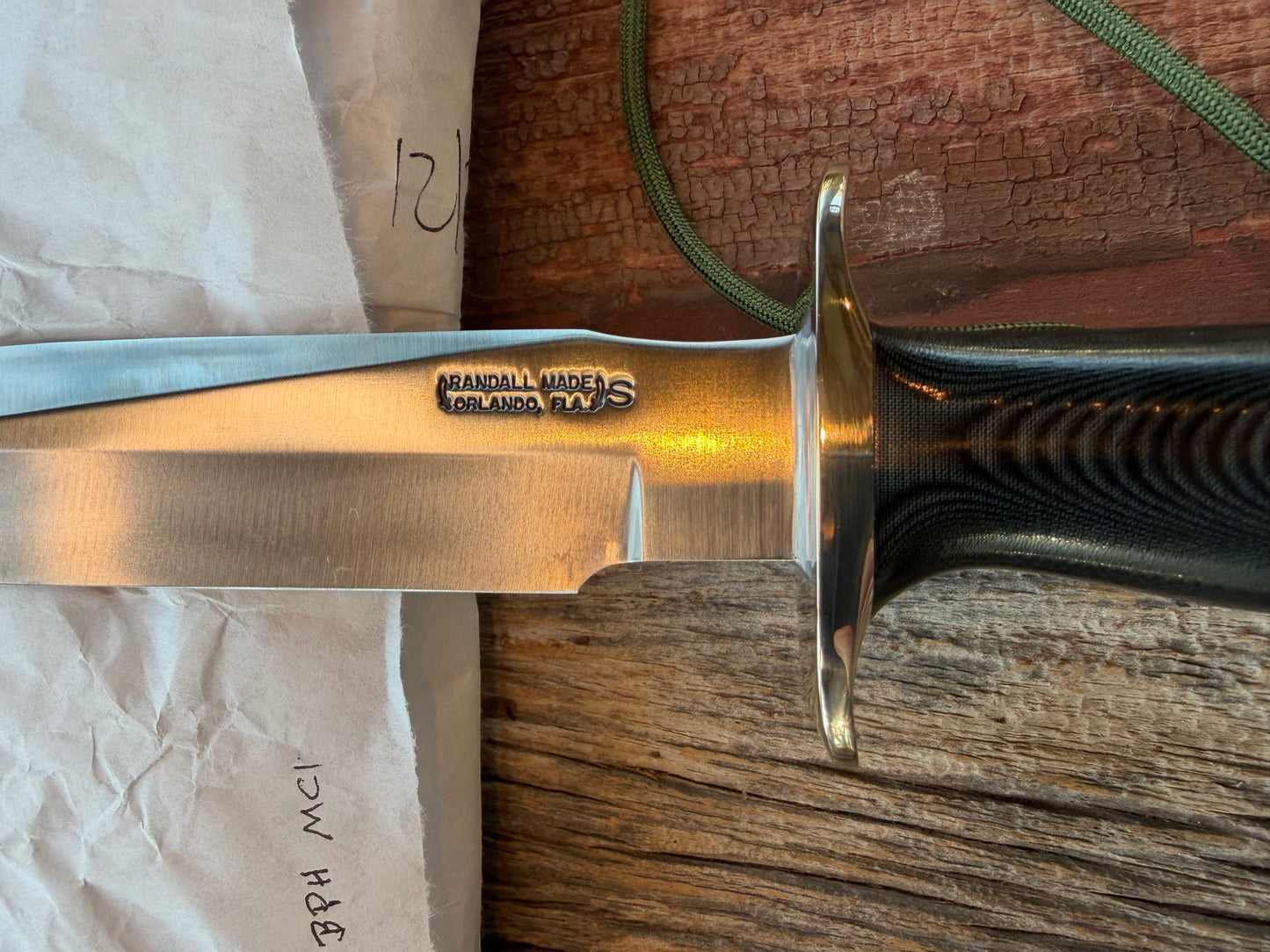 New in Paper Randall Model 16 SP#1 Special fighter with a Black Micarta handle. SS blade, Nickel silver Straight hilt. Lanyard. Brown leather sheath.