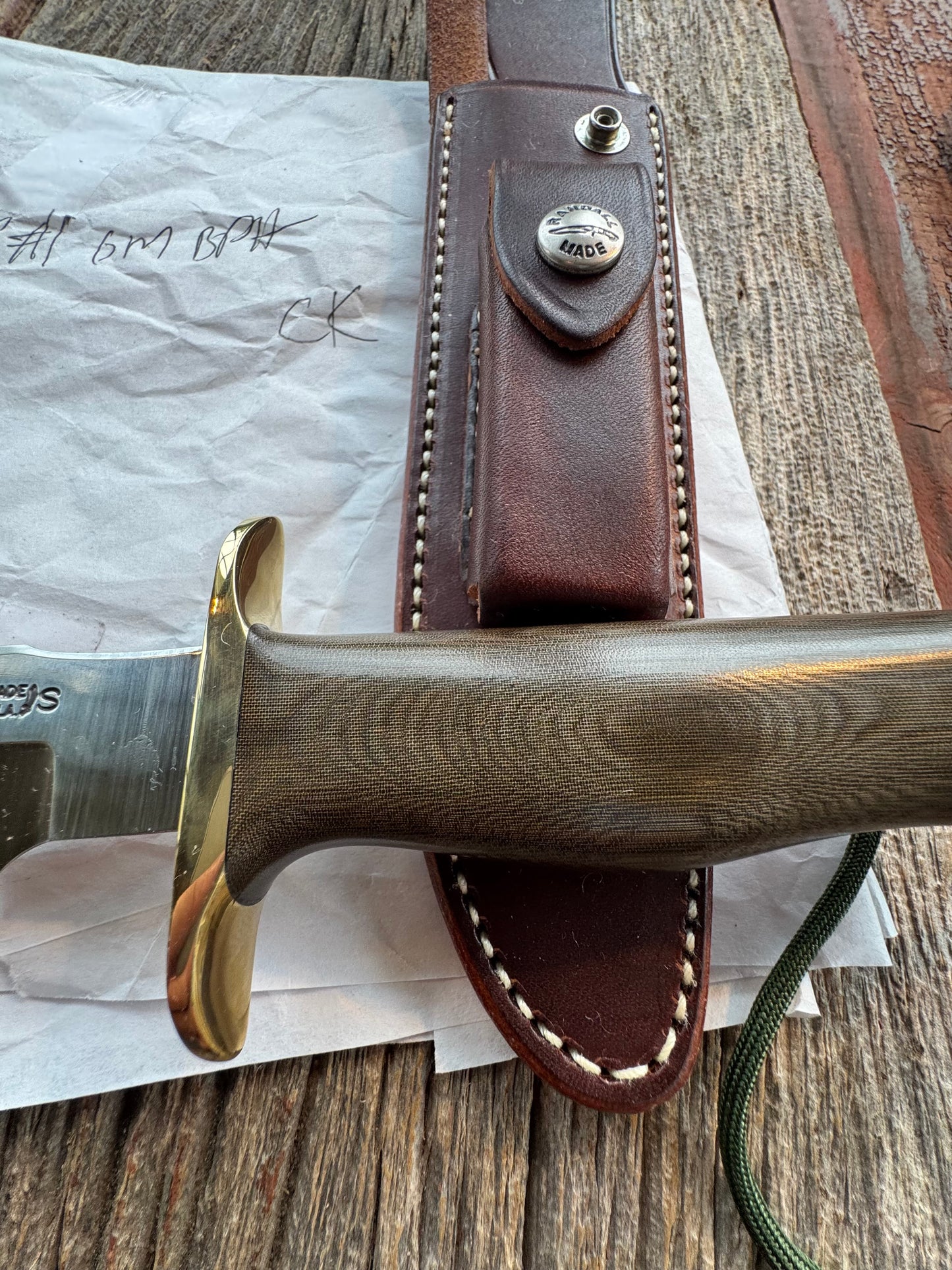 New in Paper Randall Model 16 SP#1 Special fighter with a Green Micarta handle. SS blade, Brass hilt. Lanyard. Brown leather sheath.