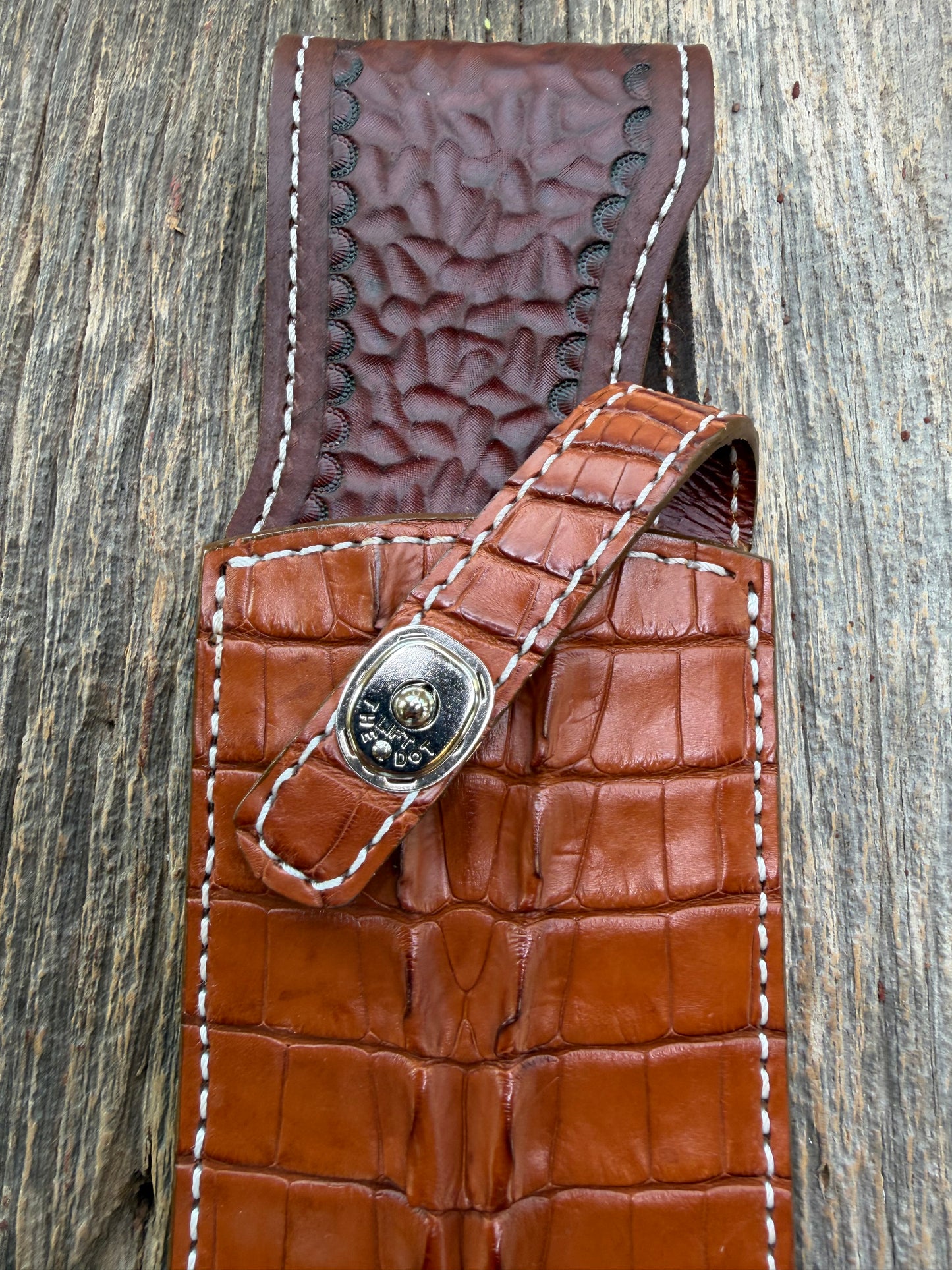 New Randall Model 12-11 Large Sasquatch Sheath in Exotic thick and textured Honey Crocodile skin ( tail portion) on brown leather from Treeman with a silver Canteen snap. Hand tooled belt loop. Killer sheath.