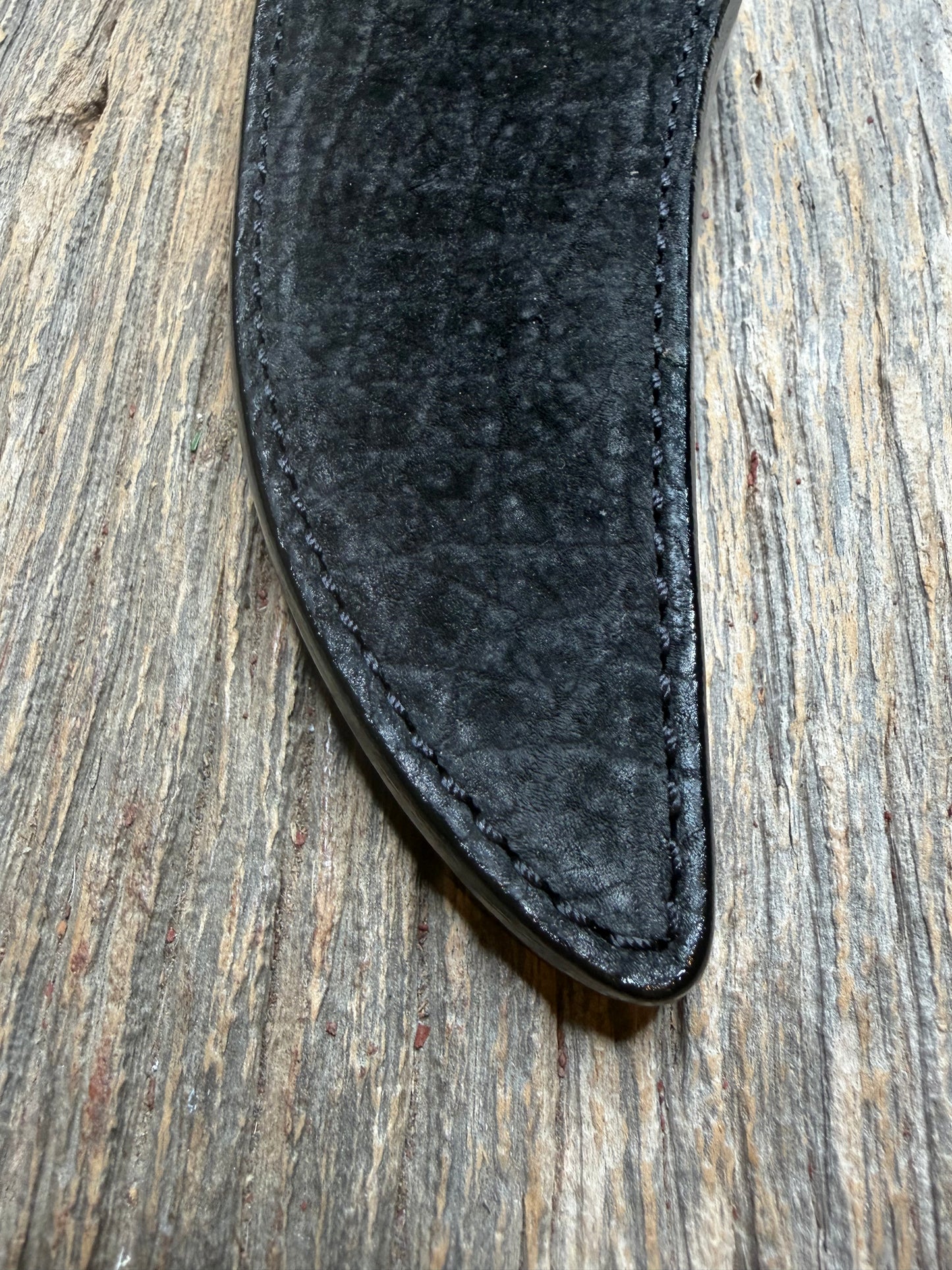 Randall Model 12-8 “Big Bear” in Black Hippo, forward curved hilt, black Canteen Snap, full brass stamping and stitching.