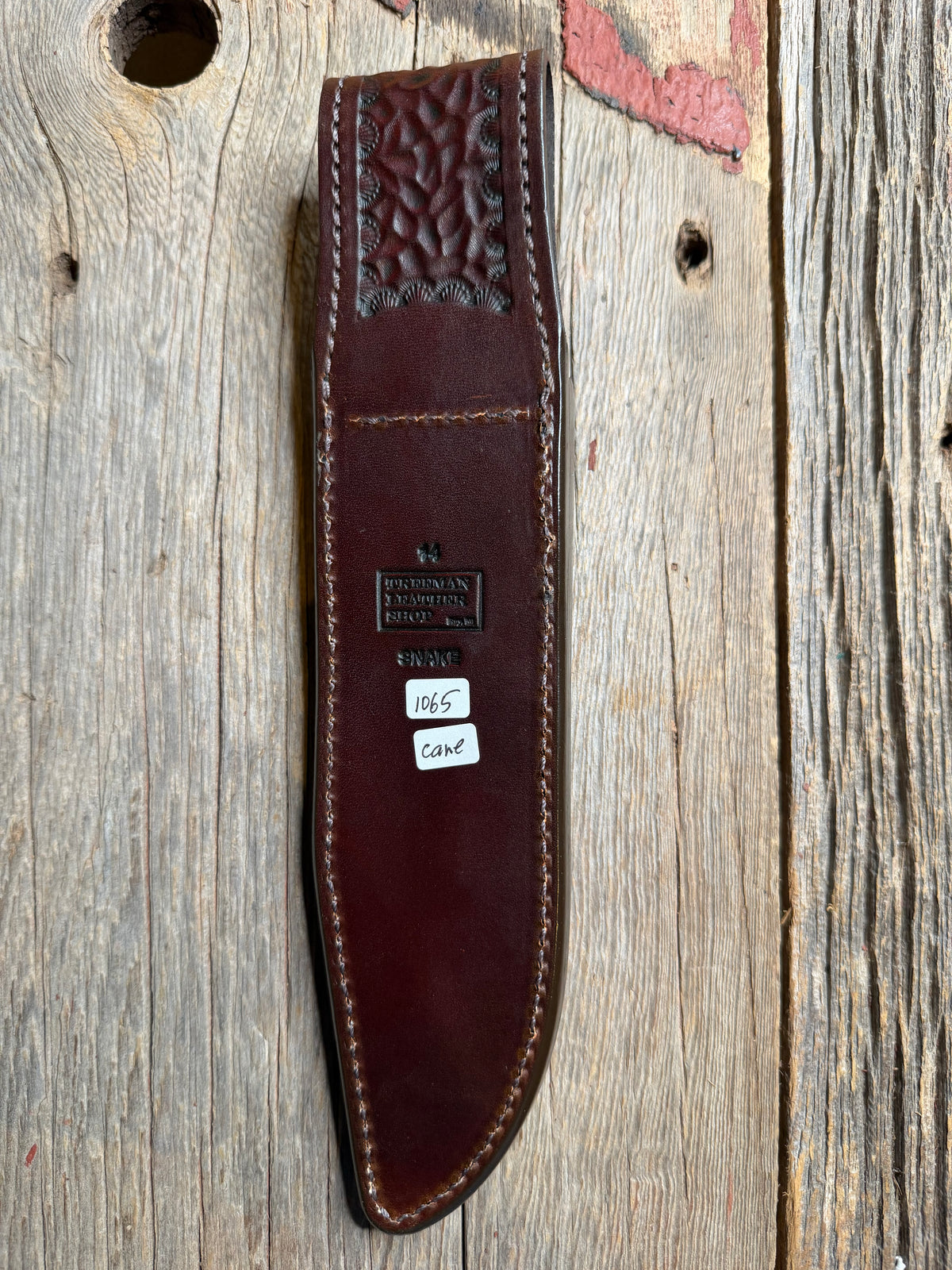 Randall Model 14 sheath with a Canebrake RattleSnake skin from Treeman Sheaths. Vibrant colors and along side Copperheads the hardest skin to source.