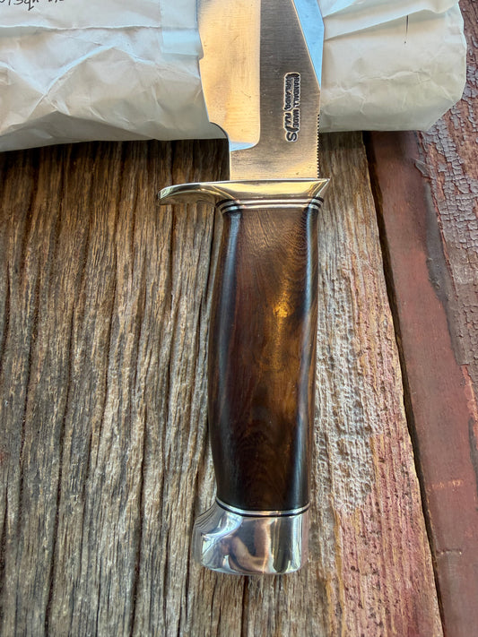 New in Paper Randall Model 19-5 with a nice piece of Ironwood. Nickel silver Hilt and Aluminum crows beak Butt cap.
