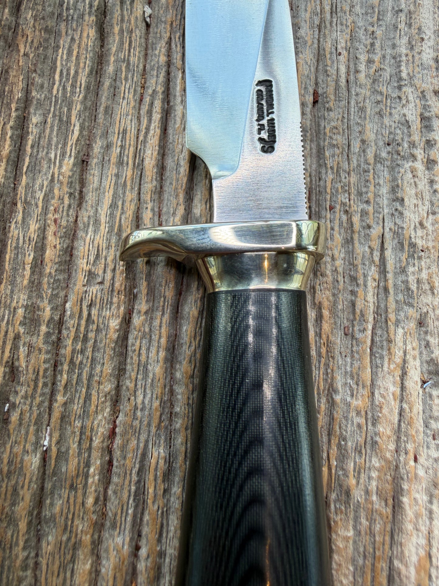 New Randall Non Catalog Model  Cattleman. Black Micarta handle. Nickel silver single hilt and collar. Stainless blade.