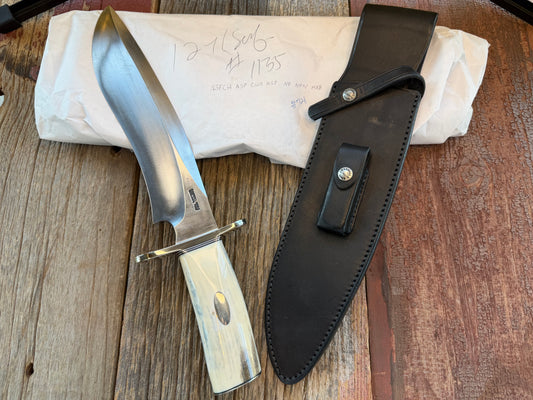 New in Paper Randall Model 12-11 Dealer Special Large Sasquatch Huge piece of Pearly White/Blue Fossil Walrus Ivory, # 1135 Nickel Silver Hilt and butt cap, nickel nameplate.