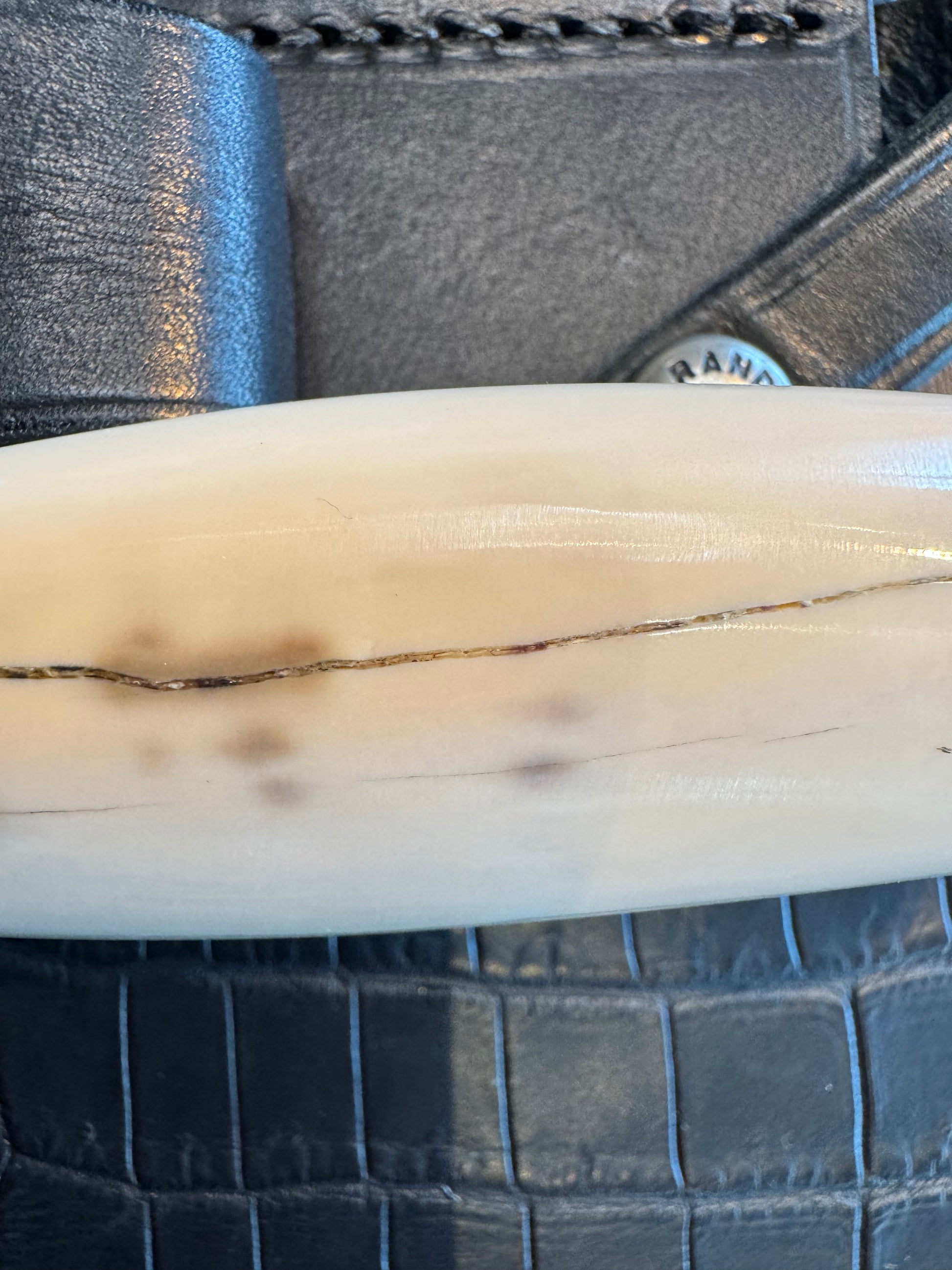 Randall Model 1-7 in Creamy Fossil Walrus Ivory. Nickel Silver Hilt and Aluminum Flanged Butt cap. ( slight crack)