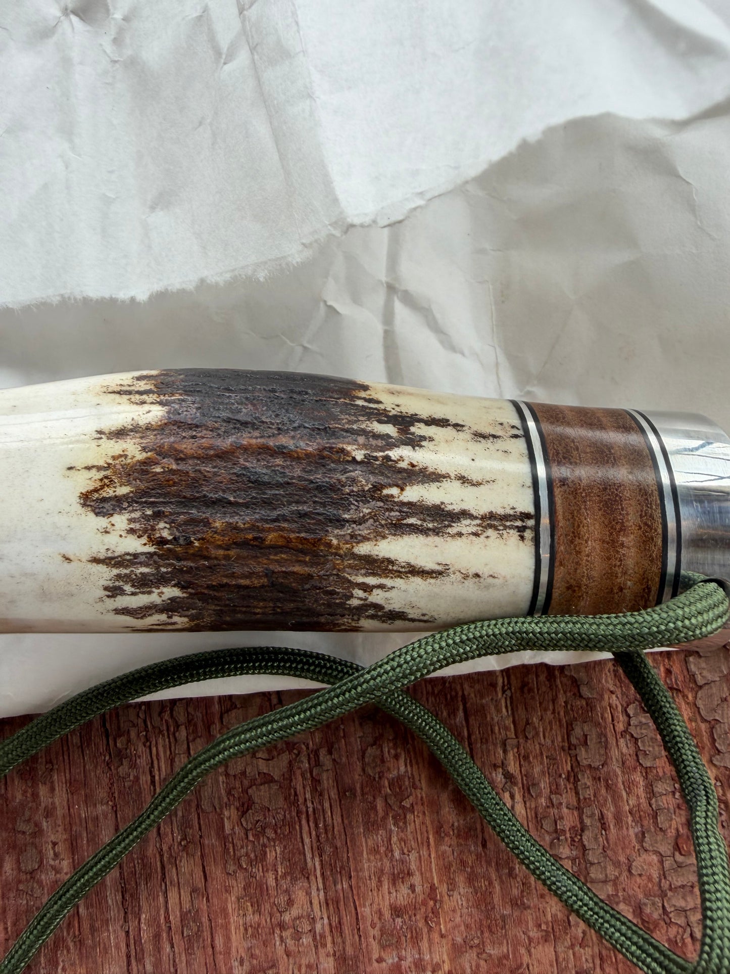 New in paper Randall Knife Model 25-6 Trapper in Stag Leather Handle Stainless Blade, nickel silver hilt , wrist thong.