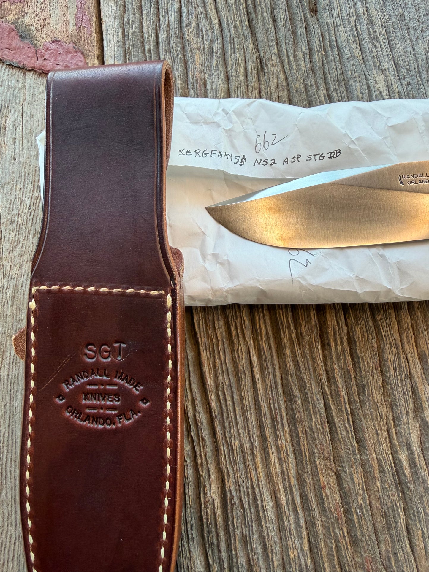 New in Paper Randall Non Catalog Model Sergeants Special. Nice Stag handle, Stainless blade, Nickel silver hilt and durillium butt cap. Brown leather sheath.