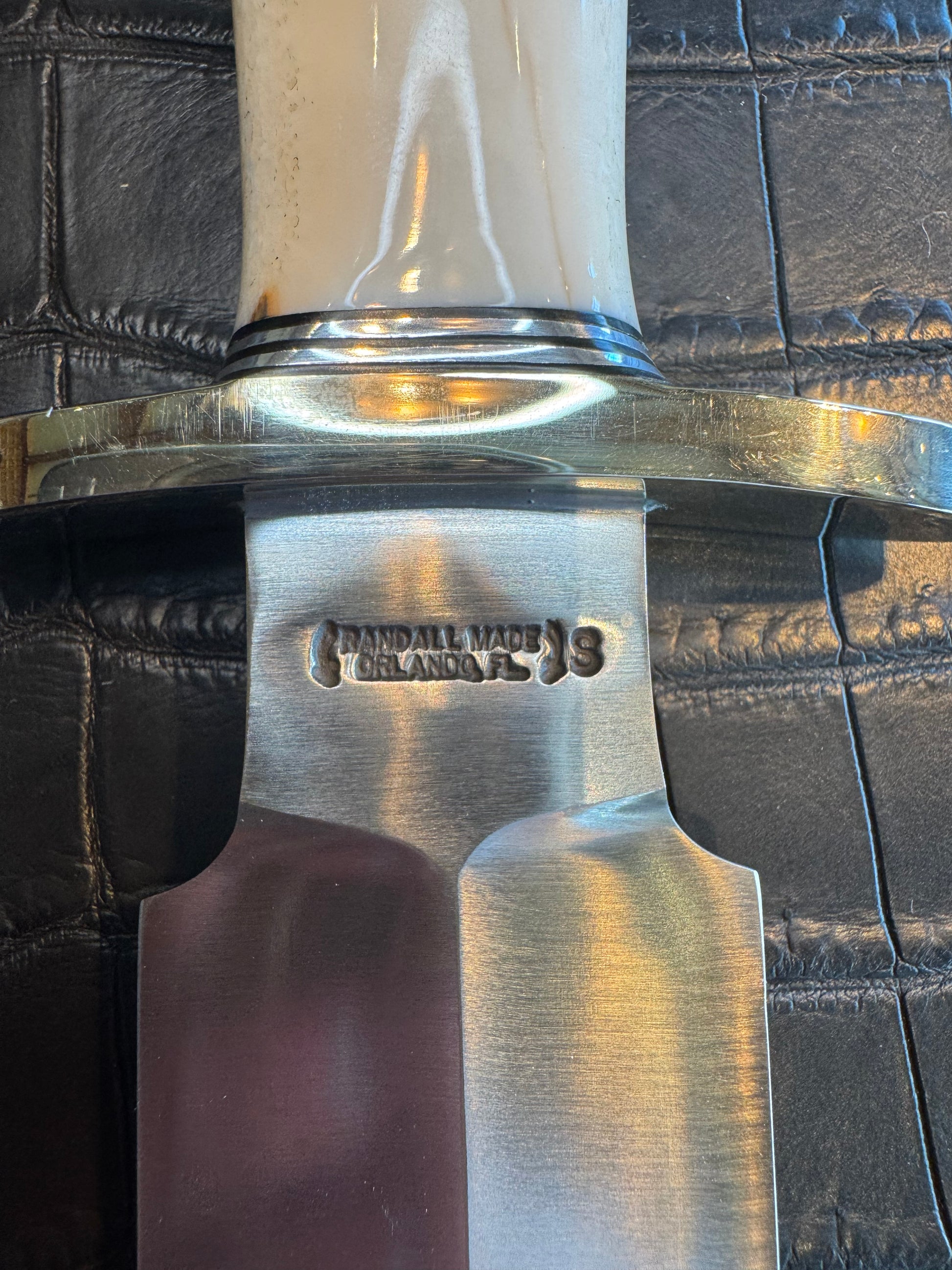 Randall Tom Clinton Dealer Special in a gorgeous piece of Creamy Fossil Walrus Ivory. Nickel Silver Hilt and Aluminum Flanged Butt cap.