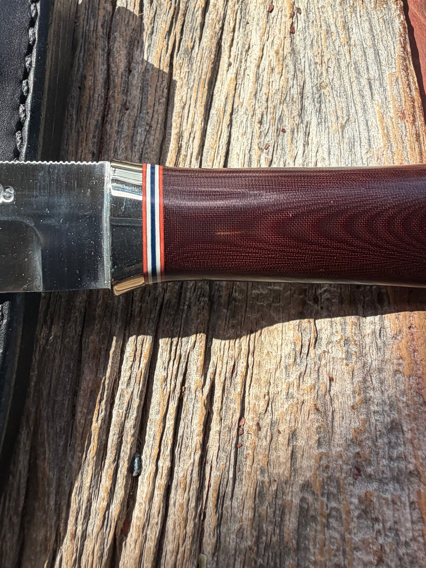 New in Paper Randall Model “Gambler” 4 Inch in a Maroon Micarta handle, Nickel hilt, Stainless steel blade, rounded nickel silver butt cap.