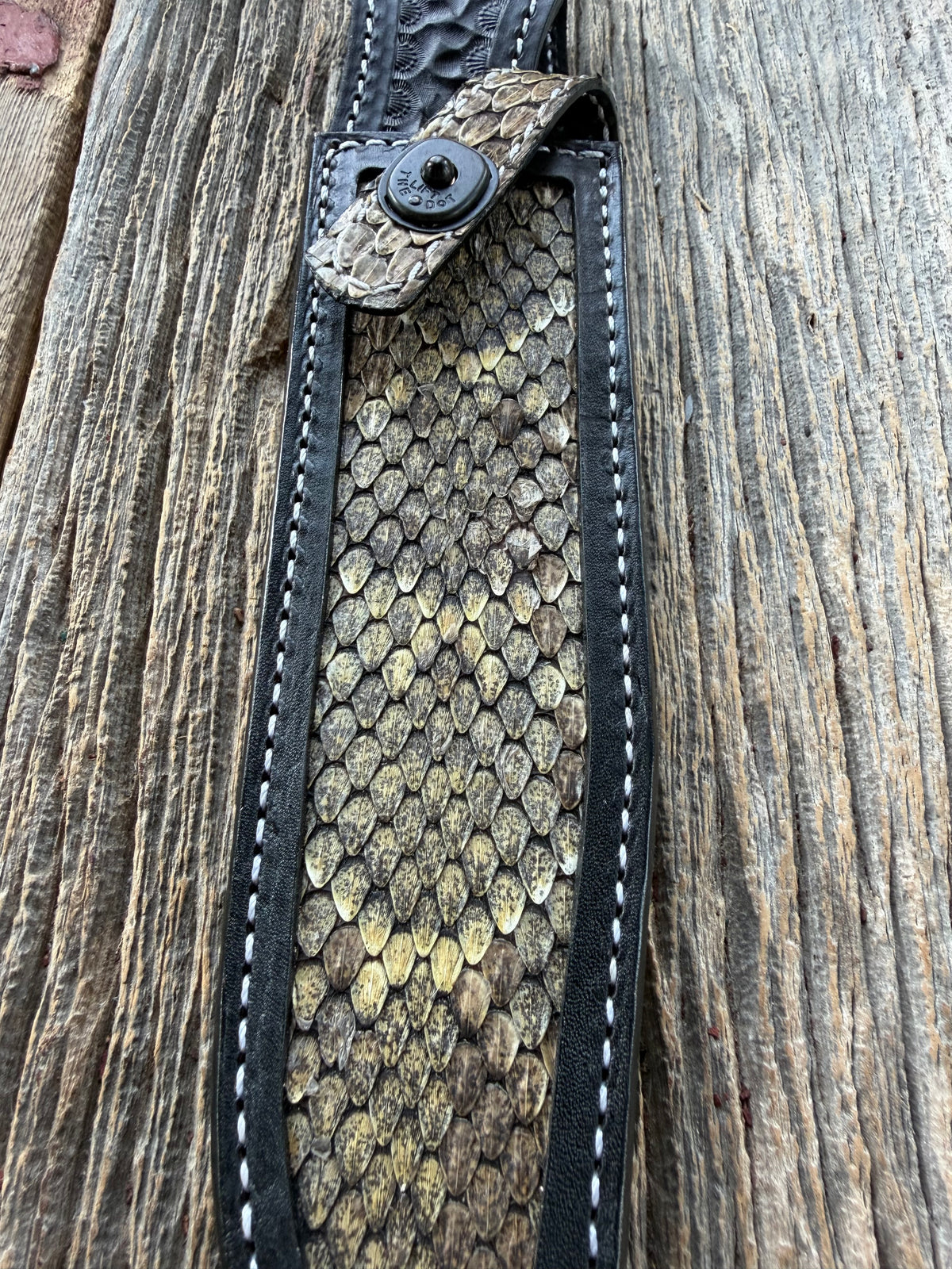 Randall Model 1-8 sheath with inlayed Western Diamondback RattleSnake skin from Treeman Sheaths. Brown leather, white deviated stitching and black canteen snaps.